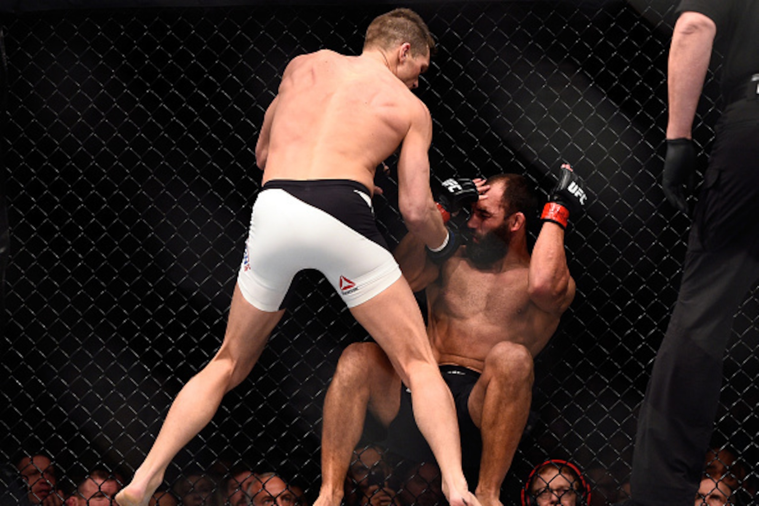LAS VEGAS, NEVADA - FEBRUARY 06:  (L-R) Stephen Thompson punches Johny Hendricks during the UFC Fight Night event inside MGM Grand Garden Arena on February 6, 2016 in Las Vegas Nevada. (Photo by Jeff Bottari/Zuffa LLC/Zuffa LLC via Getty Images)