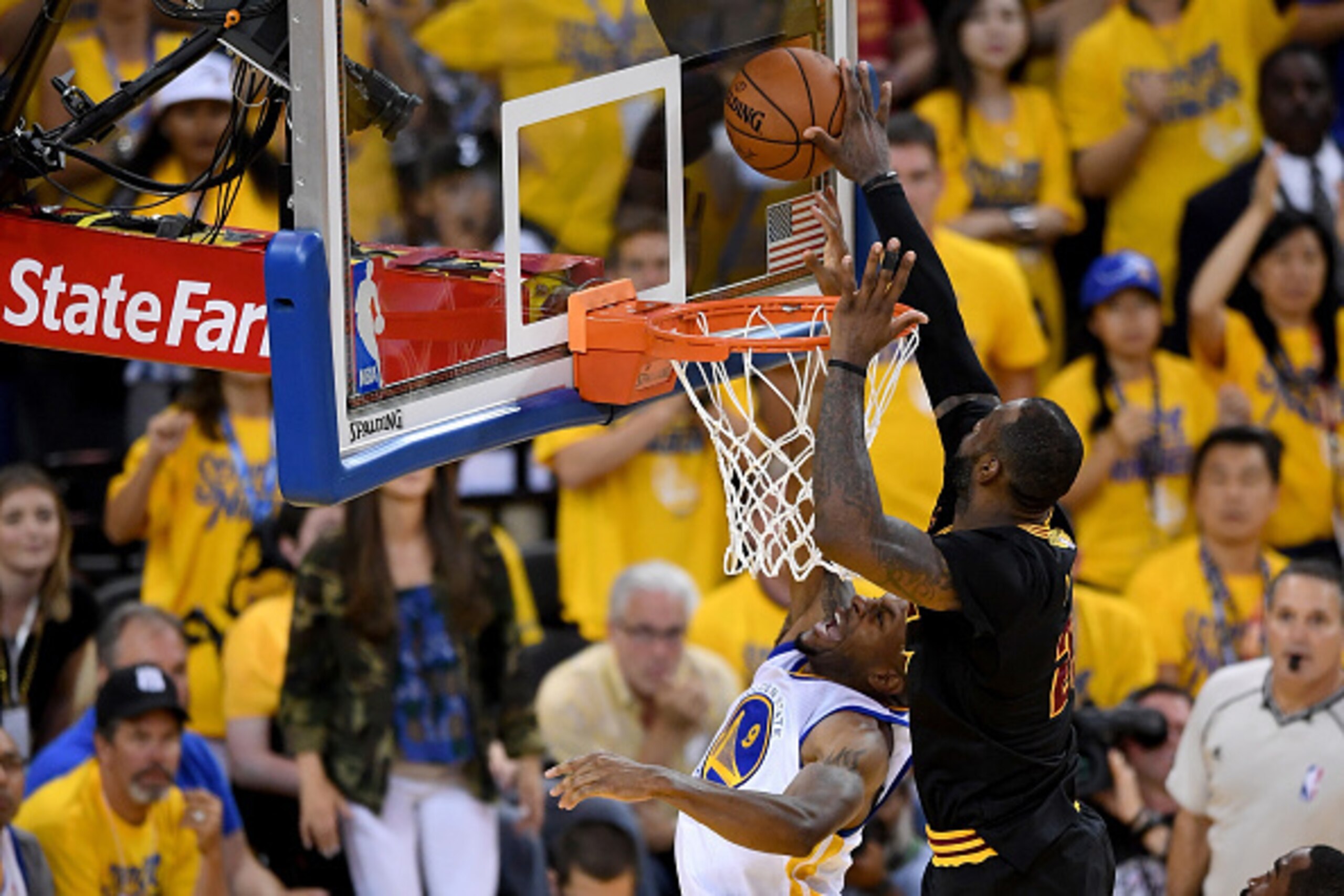 OAKLAND, CA - JUNE 19:  LeBron James #23 of the Cleveland Cavaliers blocks a shot by Andre Iguodala #9 of the Golden State Warriors in Game 7 of the 2016 NBA Finals at ORACLE Arena on June 19, 2016 in Oakland, California. NOTE TO USER: User expressly ackn