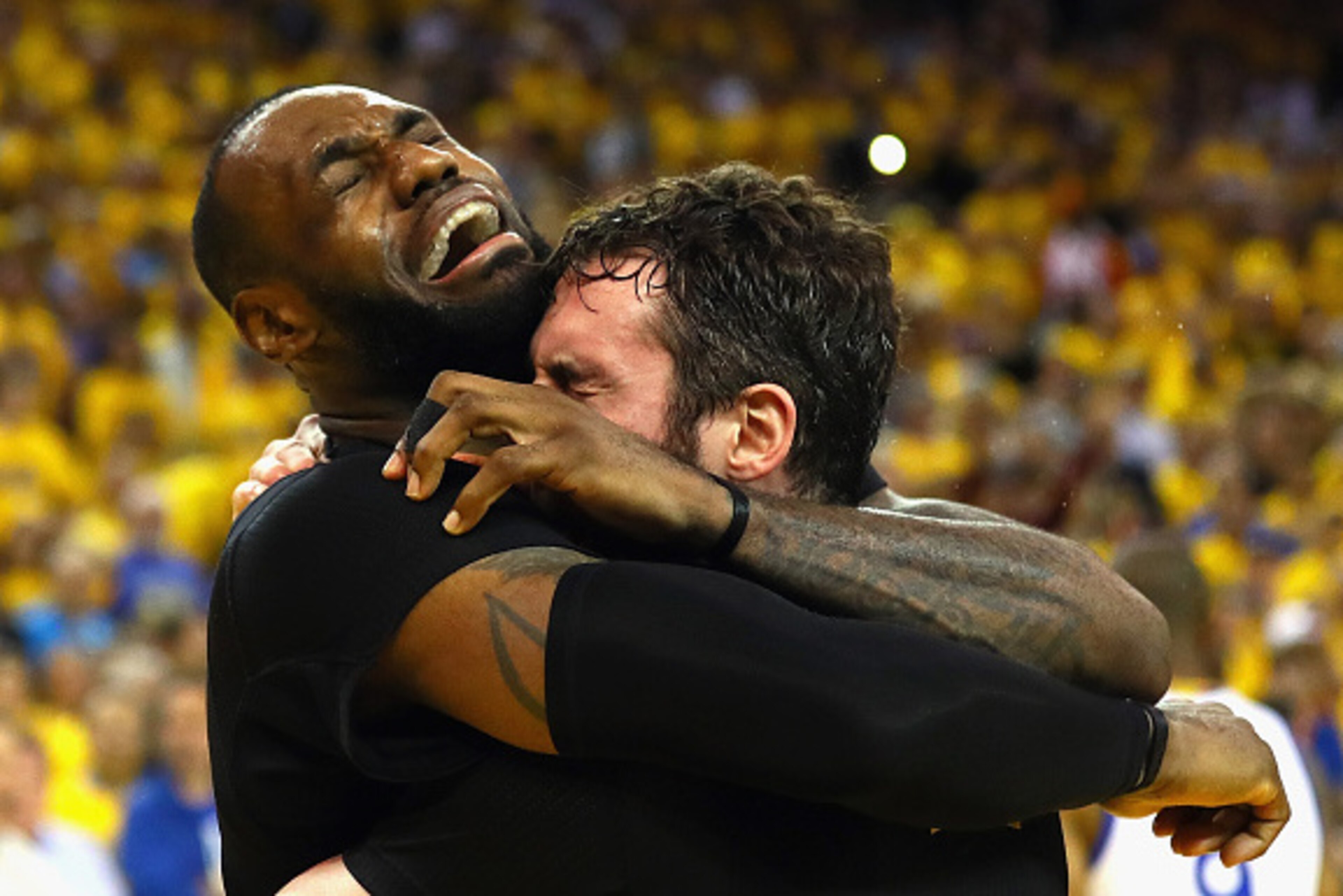OAKLAND, CA - JUNE 19:  LeBron James #23 and Kevin Love #0 of the Cleveland Cavaliers celebrate after defeating the Golden State Warriors 93-89 in Game 7 of the 2016 NBA Finals at ORACLE Arena on June 19, 2016 in Oakland, California. NOTE TO USER: User ex