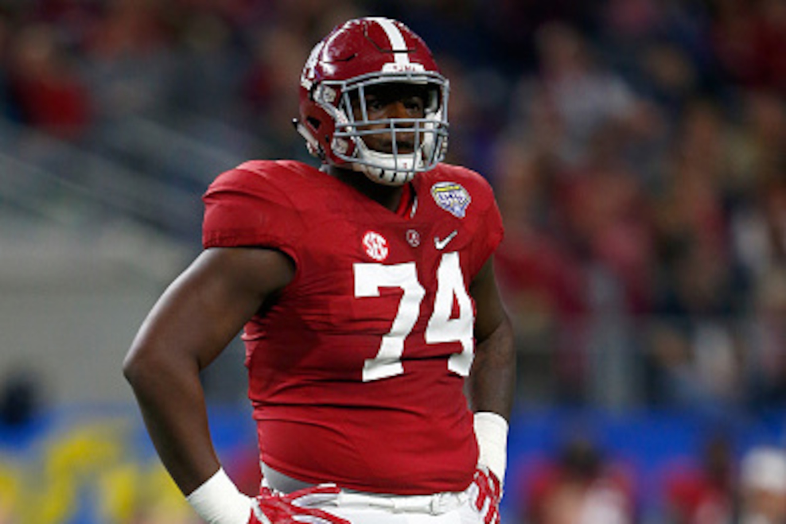 ARLINGTON, TX - DECEMBER 31:  Cam Robinson #74 of the Alabama Crimson Tide looks on against the Michigan State Spartans during the Goodyear Cotton Bowl at AT&T Stadium on December 31, 2015 in Arlington, Texas.  (Photo by Jamie Squire/Getty Images)