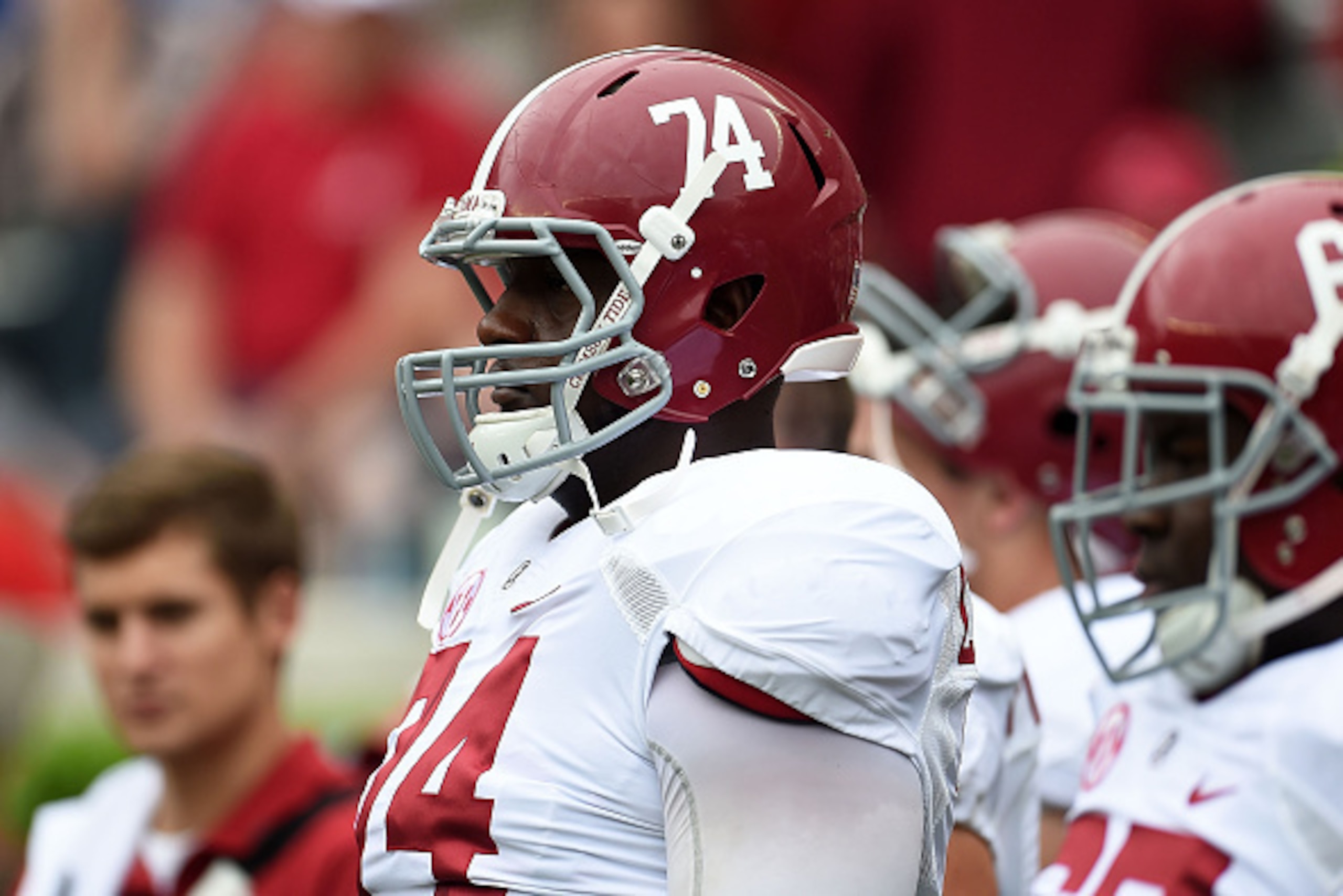 TUSCALOOSA, AL - APRIL 18:  Cam Robinson #74 of the White team watches action prior to the University of Alabama Crimson Tide A-day spring game at Bryant-Denny Stadium on April 18, 2015 in Tuscaloosa, Alabama.  (Photo by Stacy Revere/Getty Images)