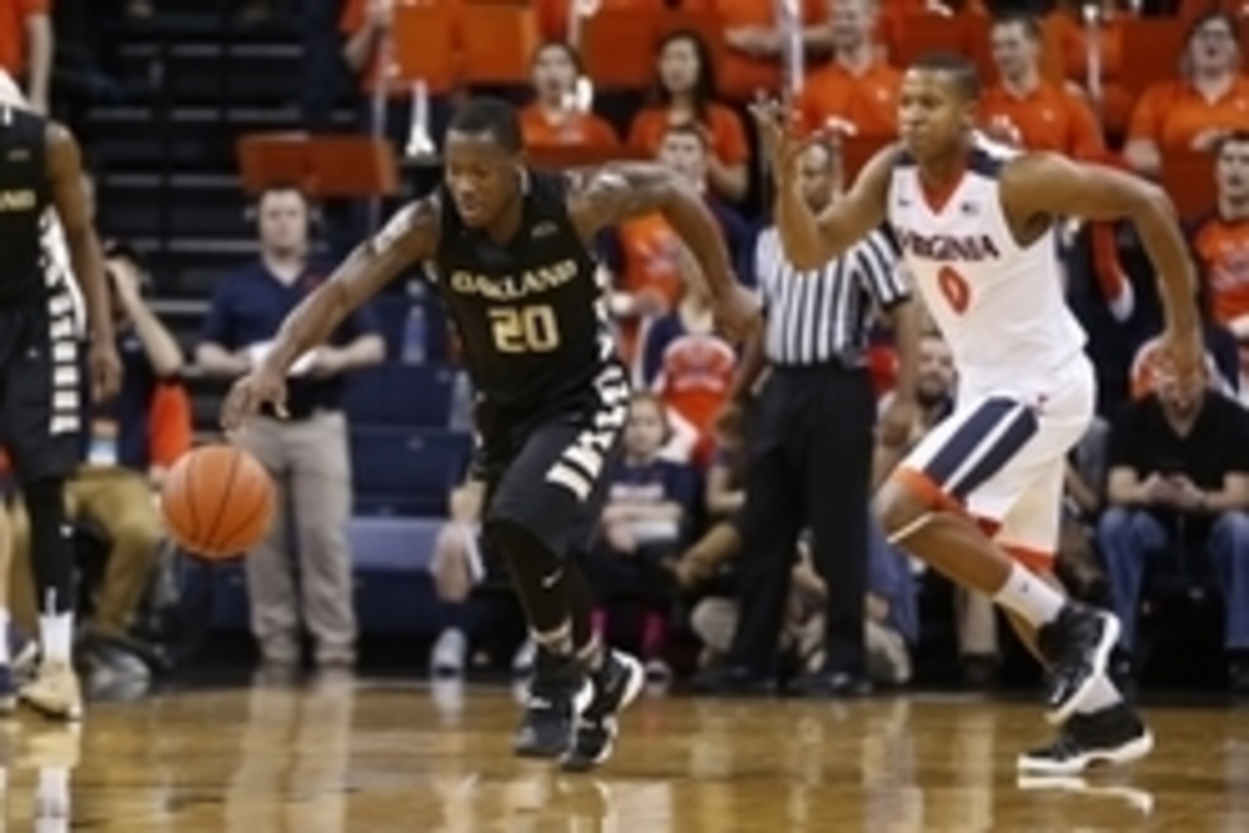 Dec 30, 2015; Charlottesville, VA, USA; Oakland Golden Grizzlies guard Kay Felder (20) steals the ball away from Virginia Cavaliers guard Devon Hall (0) during the first half at John Paul Jones Arena. Mandatory Credit: Amber Searls-USA TODAY Sports