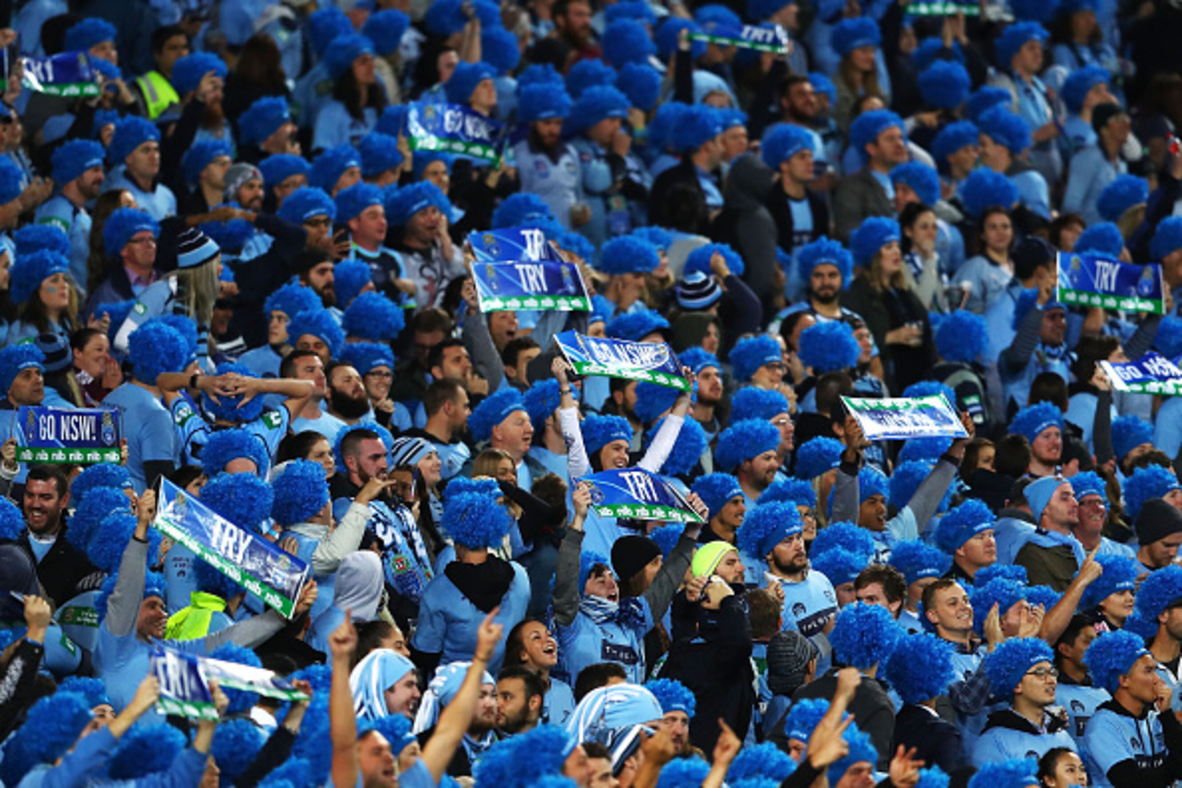SYDNEY, AUSTRALIA - JUNE 01:  Blues fans show their support during game one of the State Of Origin series between the New South Wales Blues and the Queensland Maroons at ANZ Stadium on June 1, 2016 in Sydney, Australia.  (Photo by Mark Kolbe/Getty Images)