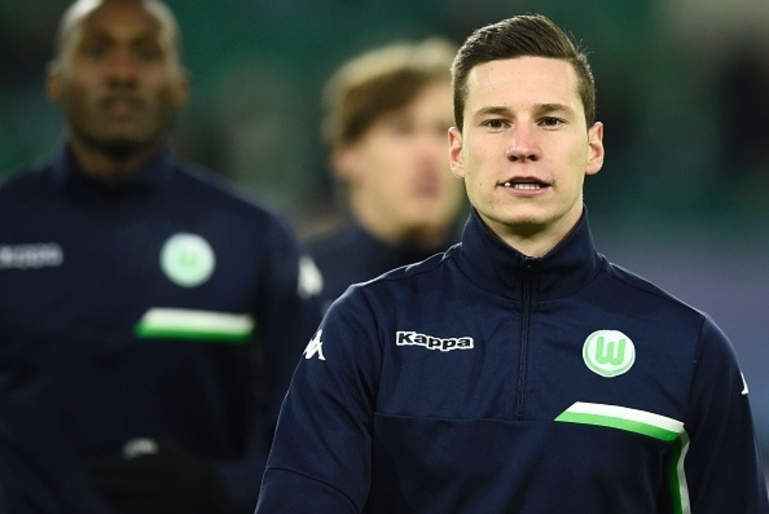 Wolfsburg's midfielder Julian Draxler is pictured prior to the second-leg round of 16 UEFA Champions league football match between VfL Wolfsburg and KAA Gent at the Volkswagen arena in Wolfsburg on March 8, 2016.
/ AFP / ODD ANDERSEN (Photo cr Wolfsburg's midfielder Julian Draxler is pictured prior to the second-leg round of 16 UEFA Champions league football match between VfL Wolfsburg and KAA Gent at the Volkswagen arena in Wolfsburg on March 8, 2016.
/ AFP / ODD ANDERSEN (Photo cr