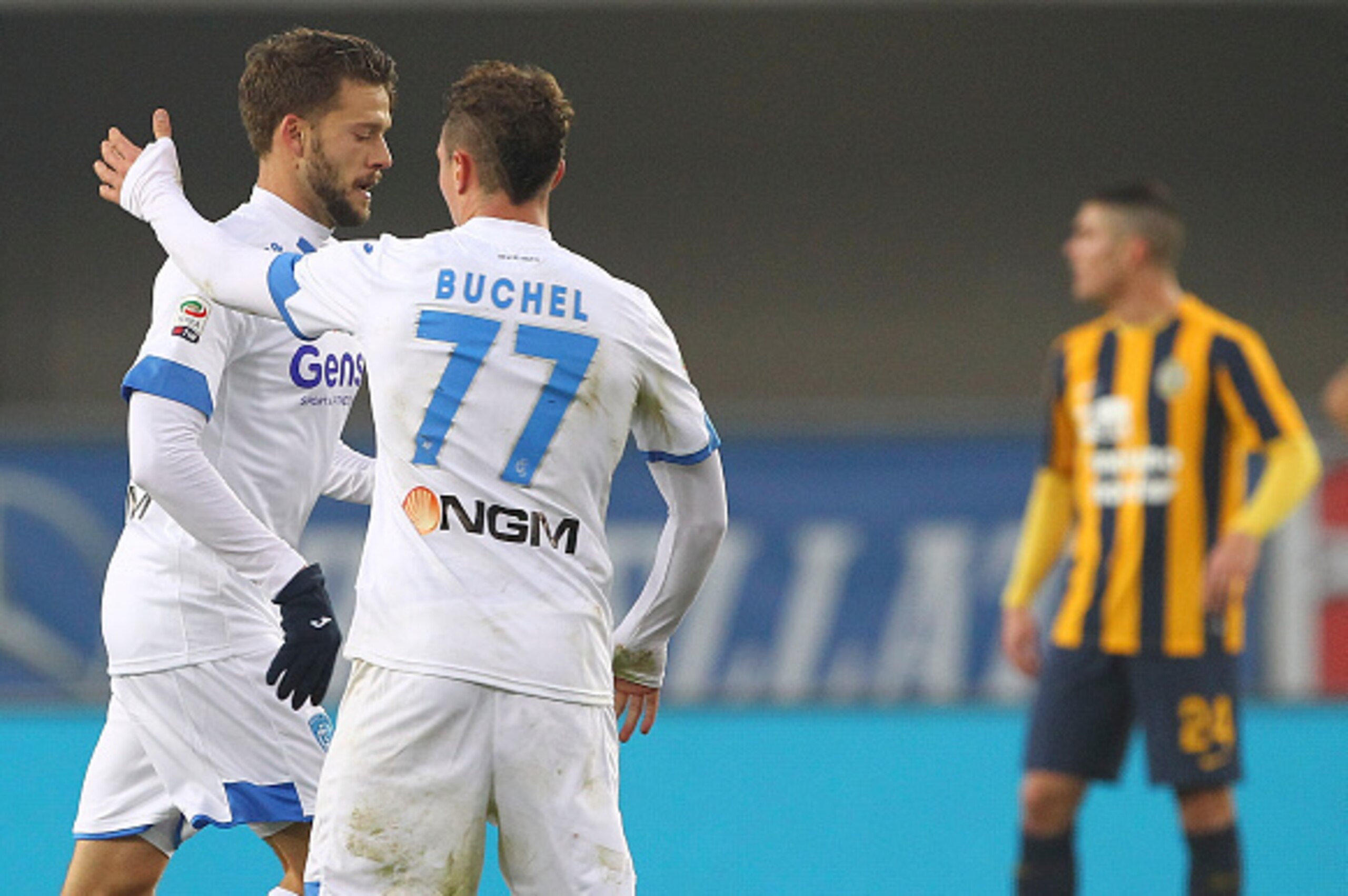 VERONA, ITALY - DECEMBER 06:  Andrea Costa (L) of Empoli FC celebrates with his team-mate Marcell Buchel (R) after scoring the opening goal during the Serie A match between Hellas Verona FC and Empoli FC at Stadio Marc'Antonio Bentegodi on December 6, 201