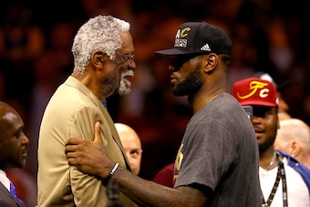 OAKLAND, CA - JUNE 19:  LeBron James #23 of the Cleveland Cavaliers speaks with Bill Russell after being named the NBA Finals Most Valuable Player after defeating the Golden State Warriors 93-89 in Game 7 of the 2016 NBA Finals at ORACLE Arena on June 19,