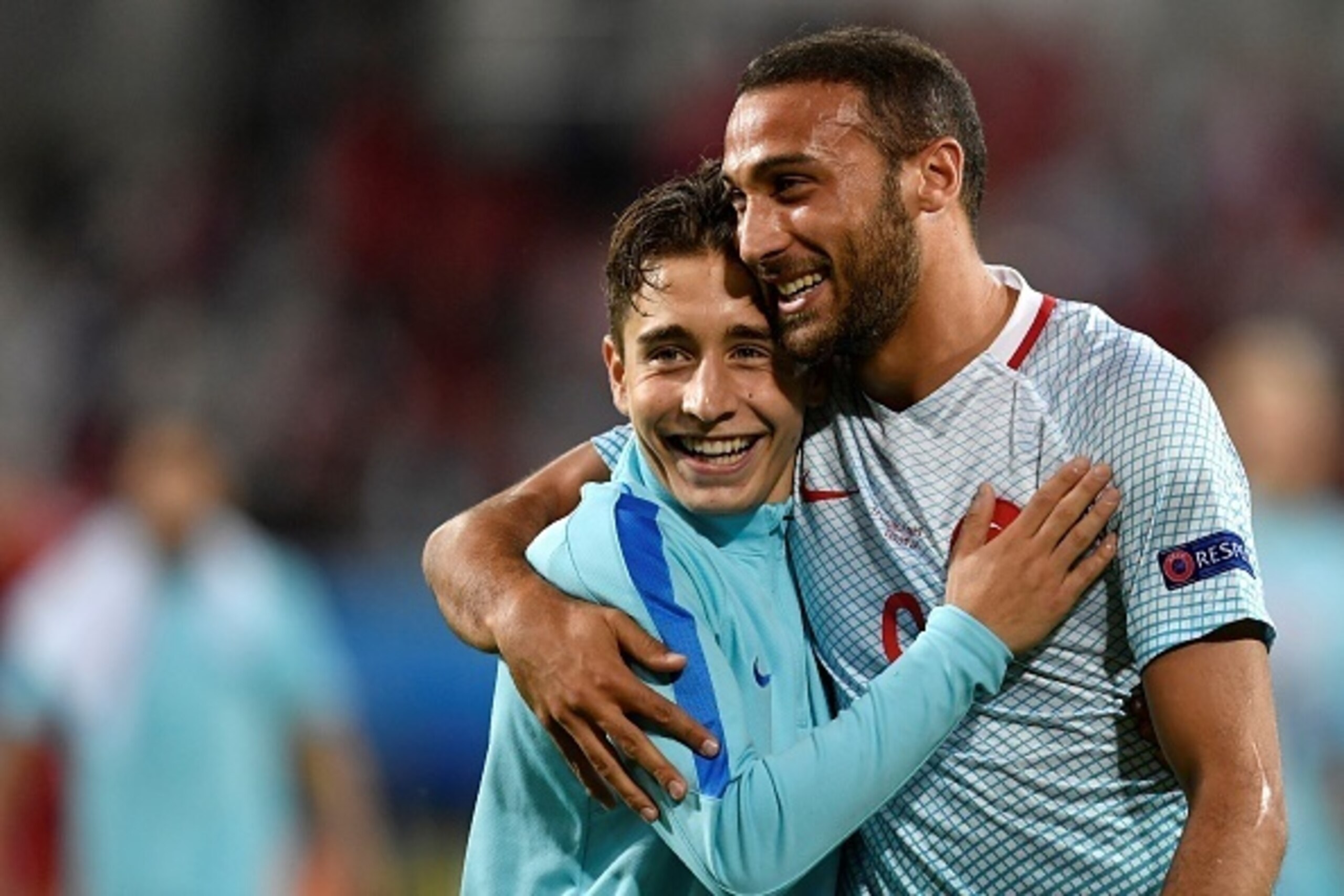 Turkey's forward Emre Mor (L) and Turkey's forward Cenk Tosun celebrate their team's victory at the end of the Euro 2016 group D football match between Czech Republic and Turkey at Bollaert-Delelis stadium in Lens on June 21, 2016. / AFP / PHILIPPE LOPEZ Turkey's forward Emre Mor (L) and Turkey's forward Cenk Tosun celebrate their team's victory at the end of the Euro 2016 group D football match between Czech Republic and Turkey at Bollaert-Delelis stadium in Lens on June 21, 2016. / AFP / PHILIPPE LOPEZ