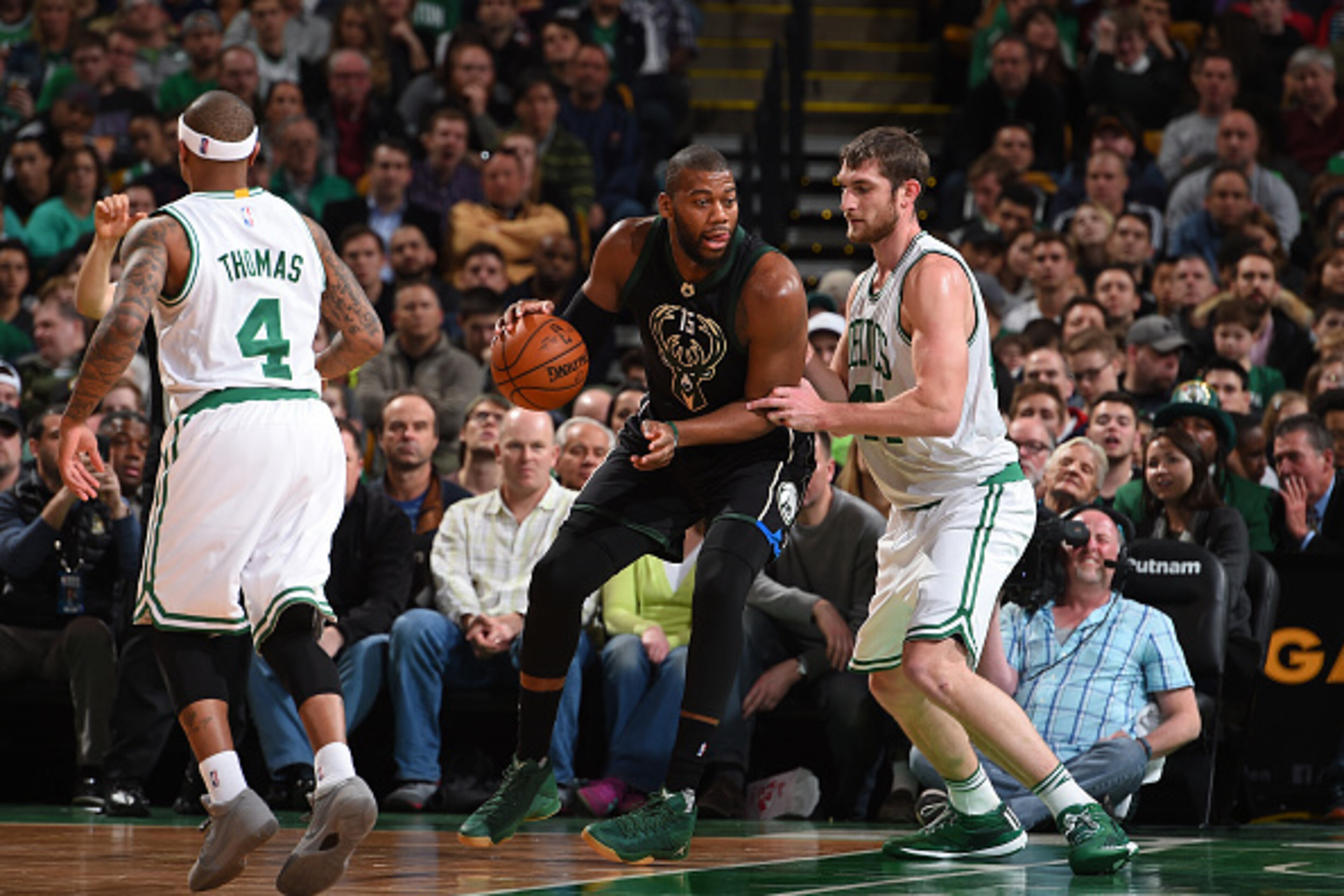 BOSTON, MA - APRIL 8: Greg Monroe #15 of the Milwaukee Bucks handles the ball against the Boston Celtics on April 8, 2016 at the TD Garden in Boston, Massachusetts.  NOTE TO USER: User expressly acknowledges and agrees that, by downloading and or using th