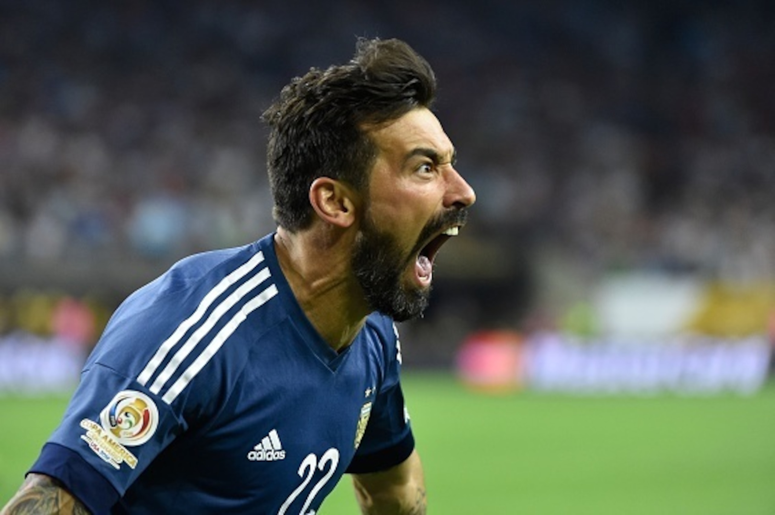 Argentina's Ezequiel Lavezzi celebrates after scoring against USA during their Copa America Centenario semifinal football match in Houston, Texas, United States, on June 21, 2016.  / AFP / Omar Torres        (Photo credit should read OMAR TORRES/AFP/Getty