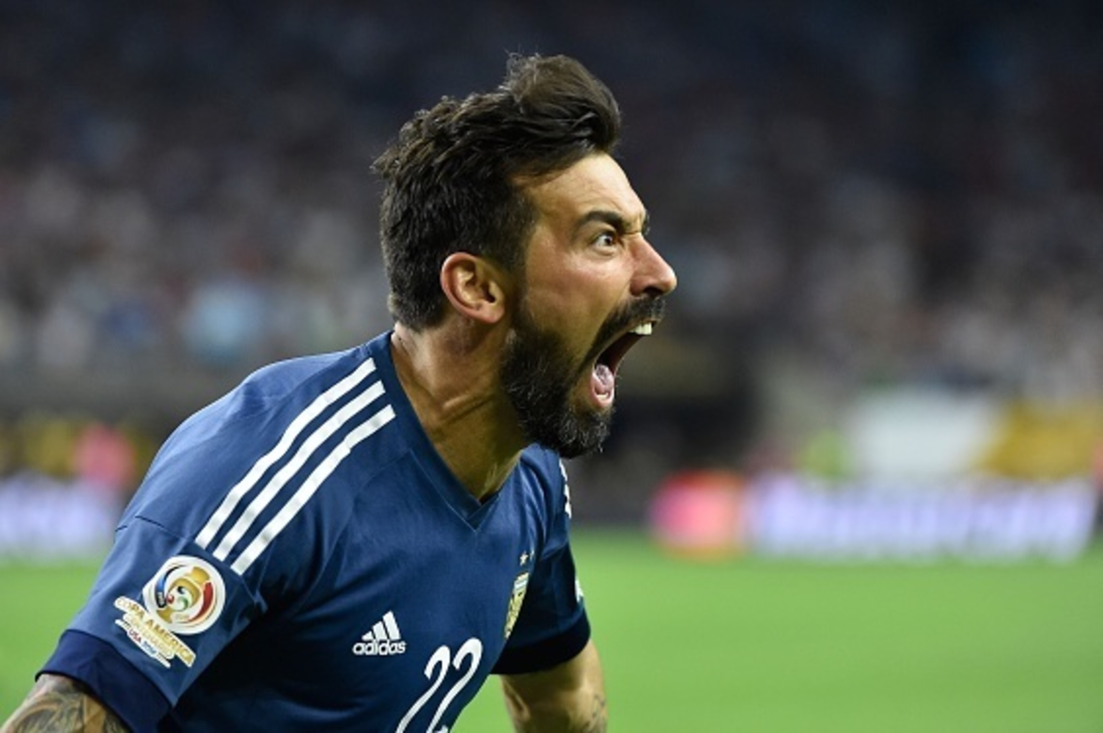 Argentina's Ezequiel Lavezzi celebrates after scoring against USA during their Copa America Centenario semifinal football match in Houston, Texas, United States, on June 21, 2016.  / AFP / Omar Torres        (Photo credit should read OMAR TORRES/AFP/Getty