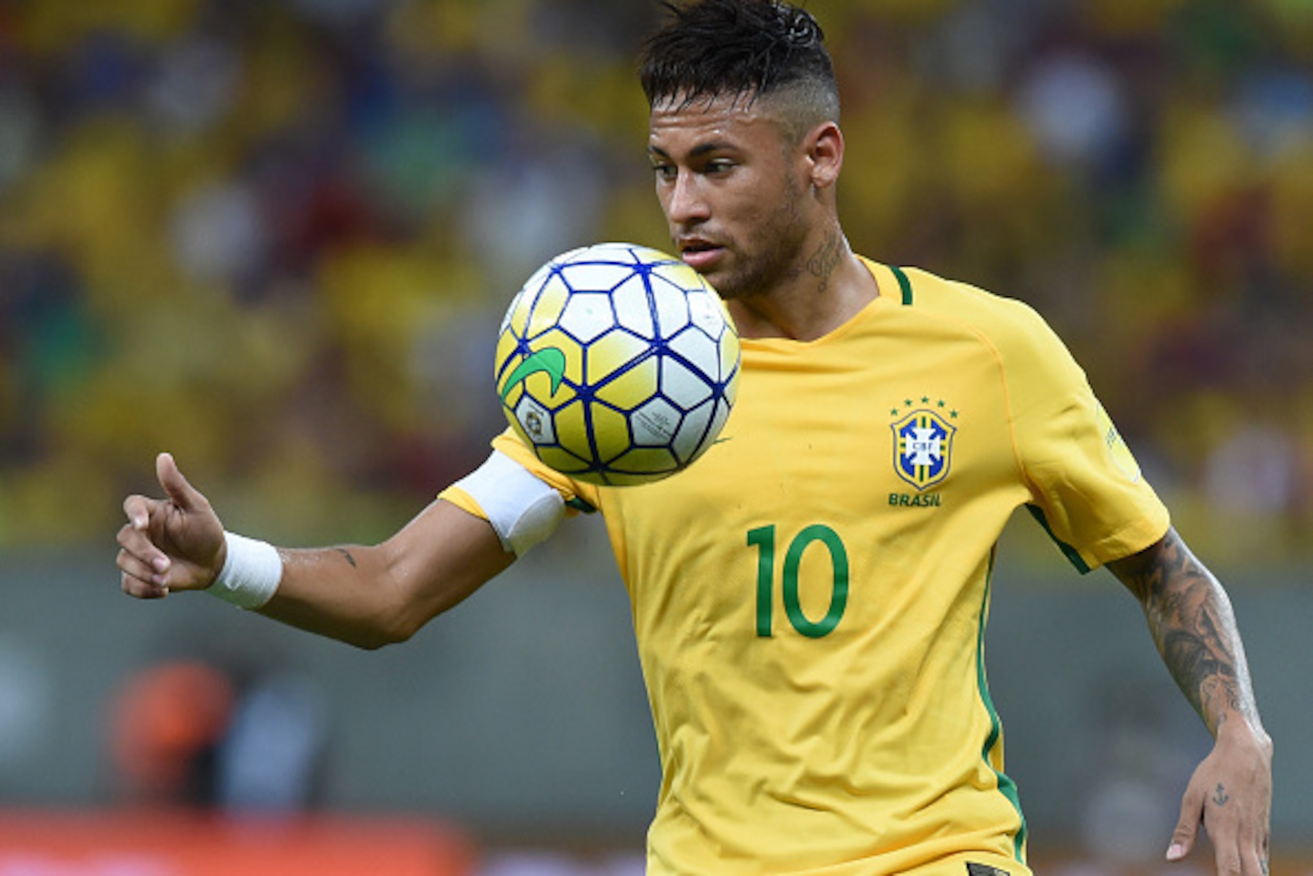 Brazil's Neymar controls the ball during the Russia 2018 FIFA World Cup South American Qualifiers' football match against Uruguay, in Recife, northeastern Brazil, on March 25, 2016. AFP PHOTO / VANDERLEI ALMEIDA / AFP / VANDERLEI ALMEIDA (Photo c Brazil's Neymar controls the ball during the Russia 2018 FIFA World Cup South American Qualifiers' football match against Uruguay, in Recife, northeastern Brazil, on March 25, 2016. AFP PHOTO / VANDERLEI ALMEIDA / AFP / VANDERLEI ALMEIDA (Photo c