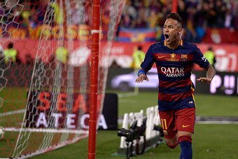Barcelona's Brazilian forward Neymar celebrates a goal during the Spanish 'Copa del Rey' (King's Cup) final match FC Barcelona vs Sevilla FC at the Vicente Calderon stadium in Madrid on May 22, 2016. / AFP / JOSEP LAGO        (Photo credit should read JOS