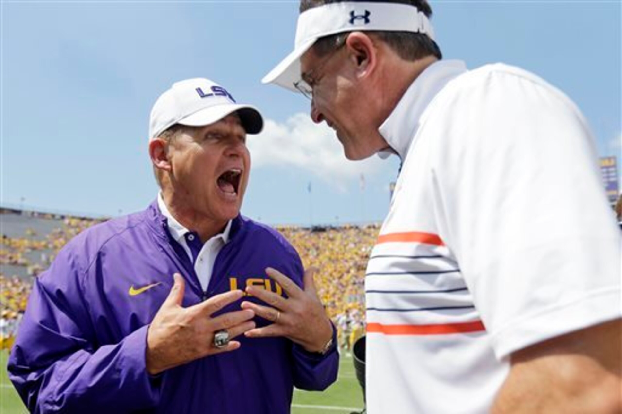 LSU head coach Les Miles (left) and Auburn head coach Gus Malzahn (right)