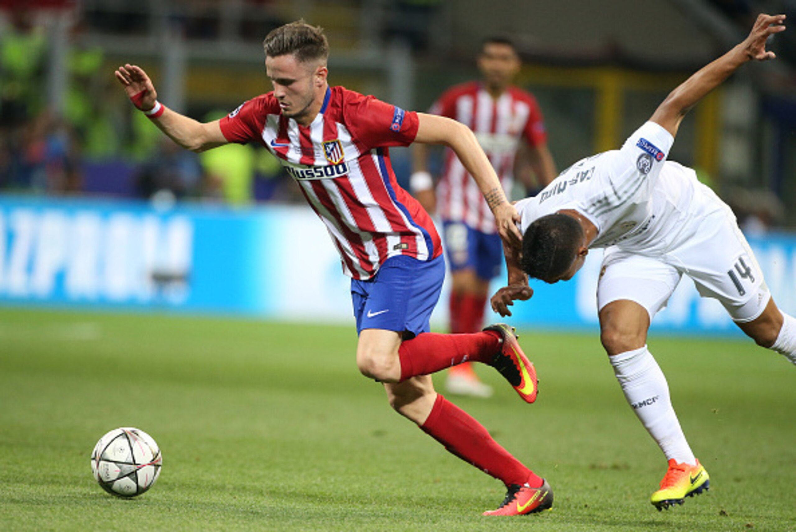 MILAN, ITALY - MAY 28: Saul Niguez of Atletico Madrid and Casemiro of Real Madrid in action during the UEFA Champions League final between Real Madrid and Club Atletico Madrid at Stadio Giuseppe Meazza, San Siro on May 28, 2016 in Milan, Italy. (Photo by MILAN, ITALY - MAY 28: Saul Niguez of Atletico Madrid and Casemiro of Real Madrid in action during the UEFA Champions League final between Real Madrid and Club Atletico Madrid at Stadio Giuseppe Meazza, San Siro on May 28, 2016 in Milan, Italy. (Photo by