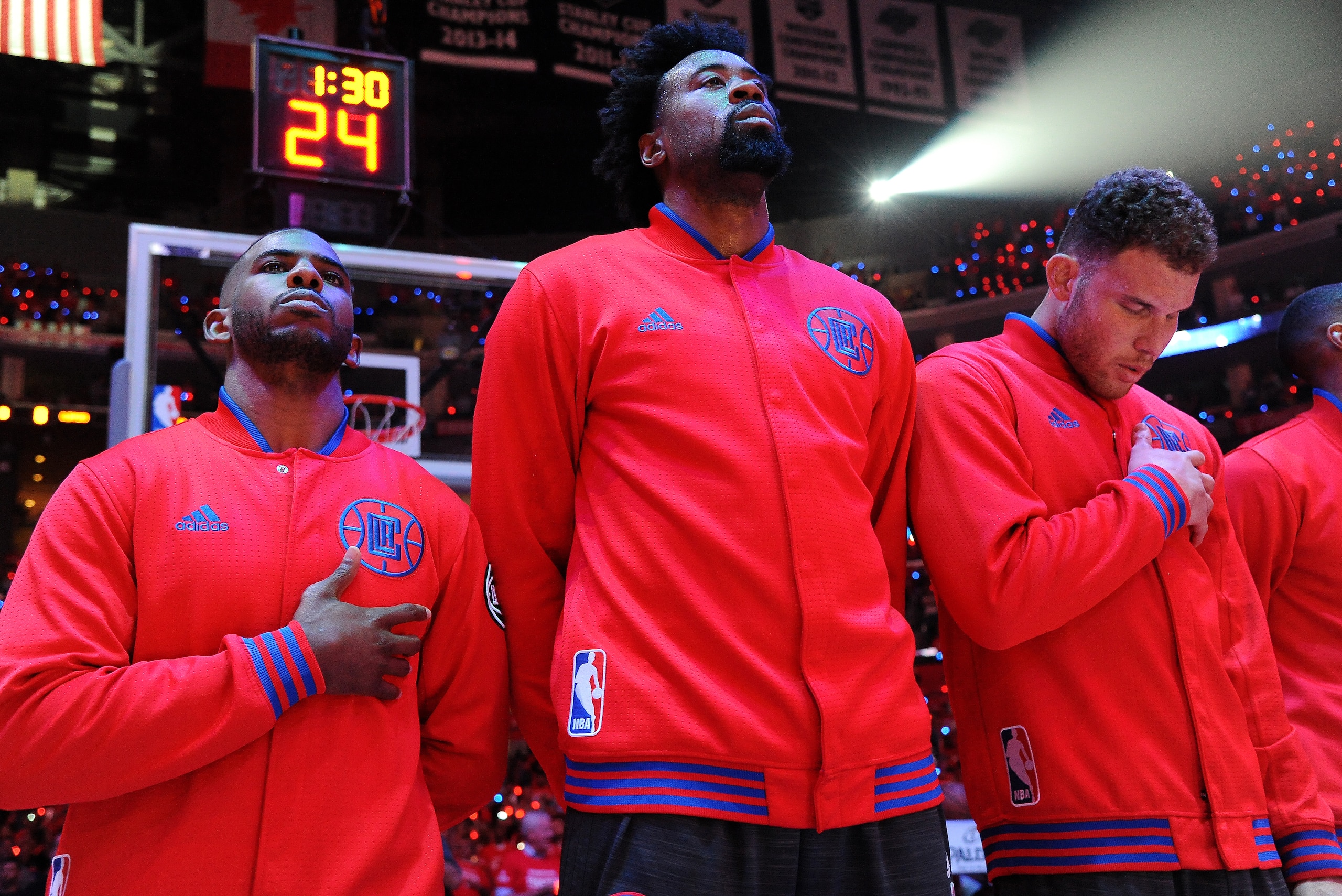 LOS ANGELES, CA - APRIL 20: Chris Paul #3, DeAndre Jordan #6, and Blake Griffin #32 of the Los Angeles Clippers stand for a moment of silence for the National Anthem before the game against the Portland Trail Blazers in Game Two of the Western Conference