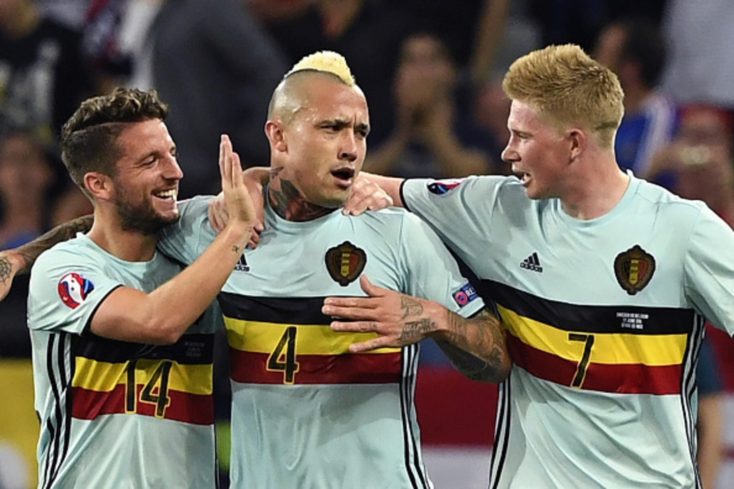 Belgium's midfielder Radja Nainggolan (C) is congratulated by Belgium's forward Dries Mertens (L) and Belgium's midfielder Kevin De Bruyne after scoring a goal during the Euro 2016 group E football match between Sweden and Belgium at the Allianz Riviera s Belgium's midfielder Radja Nainggolan (C) is congratulated by Belgium's forward Dries Mertens (L) and Belgium's midfielder Kevin De Bruyne after scoring a goal during the Euro 2016 group E football match between Sweden and Belgium at the Allianz Riviera s