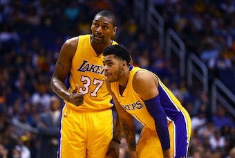 Mar 23, 2016; Phoenix, AZ, USA; Los Angeles Lakers forward Metta World Peace (37) and guard D'Angelo Russell (1) against the Phoenix Suns at Talking Stick Resort Arena. The Suns defeated the Lakers 119-107. Mandatory Credit: Mark J. Rebilas-USA TODAY Spor