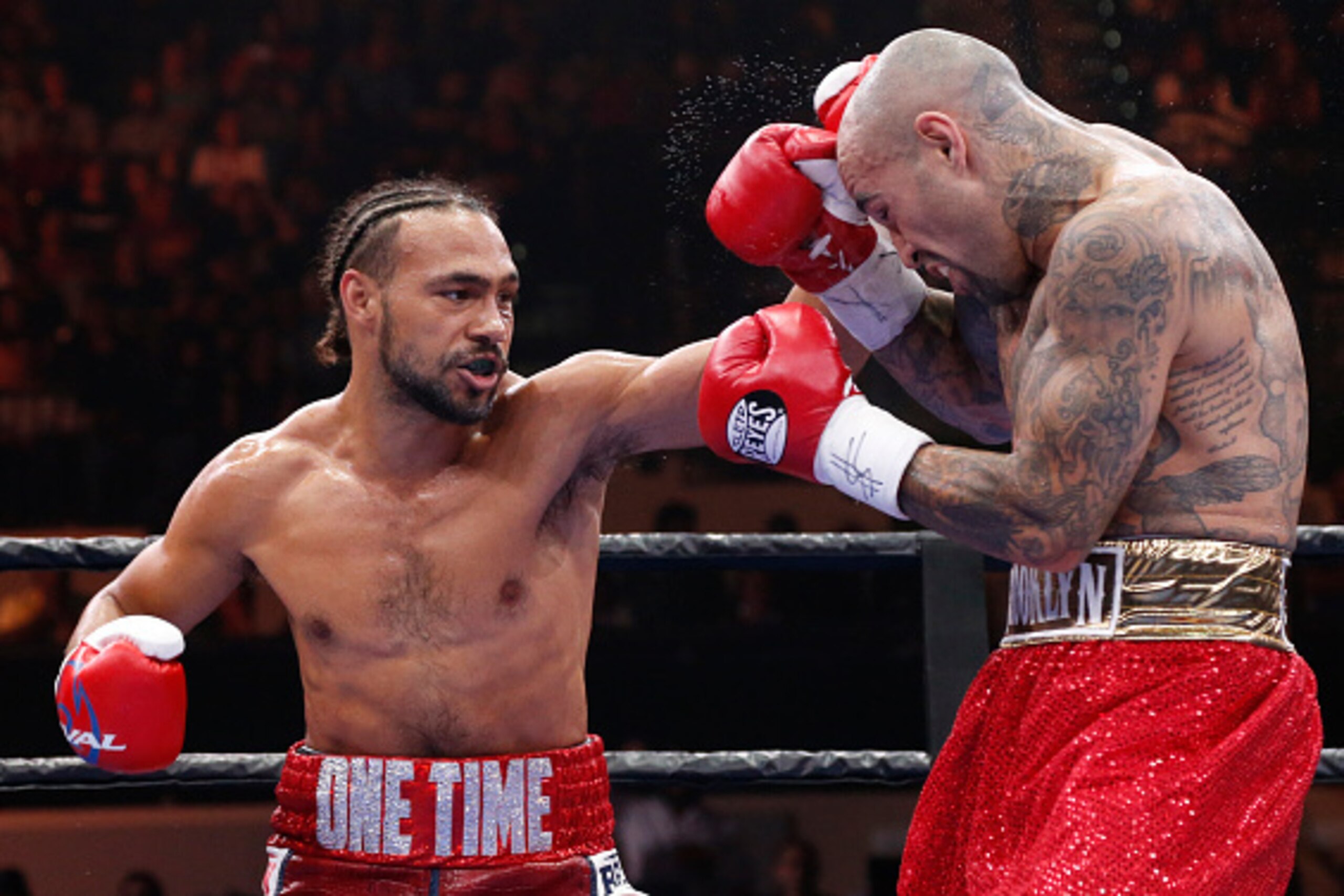 TAMPA, FL - JULY 11:  Keith Thurman (L) exchanges blows with Luis Collazo during their WBA Welterweight fight on July 11, 2015 at the USF Sun Dome in Tampa, Florida.  (Photo by Brian Blanco/Getty Images)