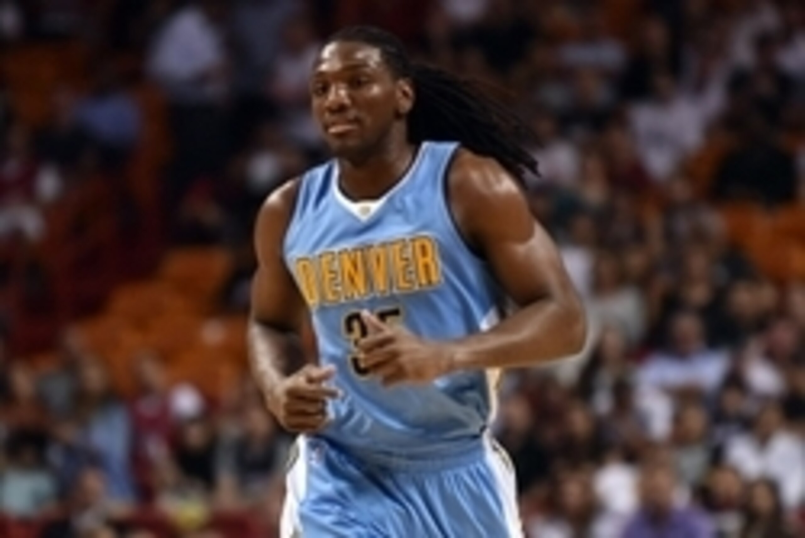 Mar 14, 2016; Miami, FL, USA; Denver Nuggets forward Kenneth Faried (35) runs up court during the first half against the Miami Heat at American Airlines Arena. Mandatory Credit: Steve Mitchell-USA TODAY Sports