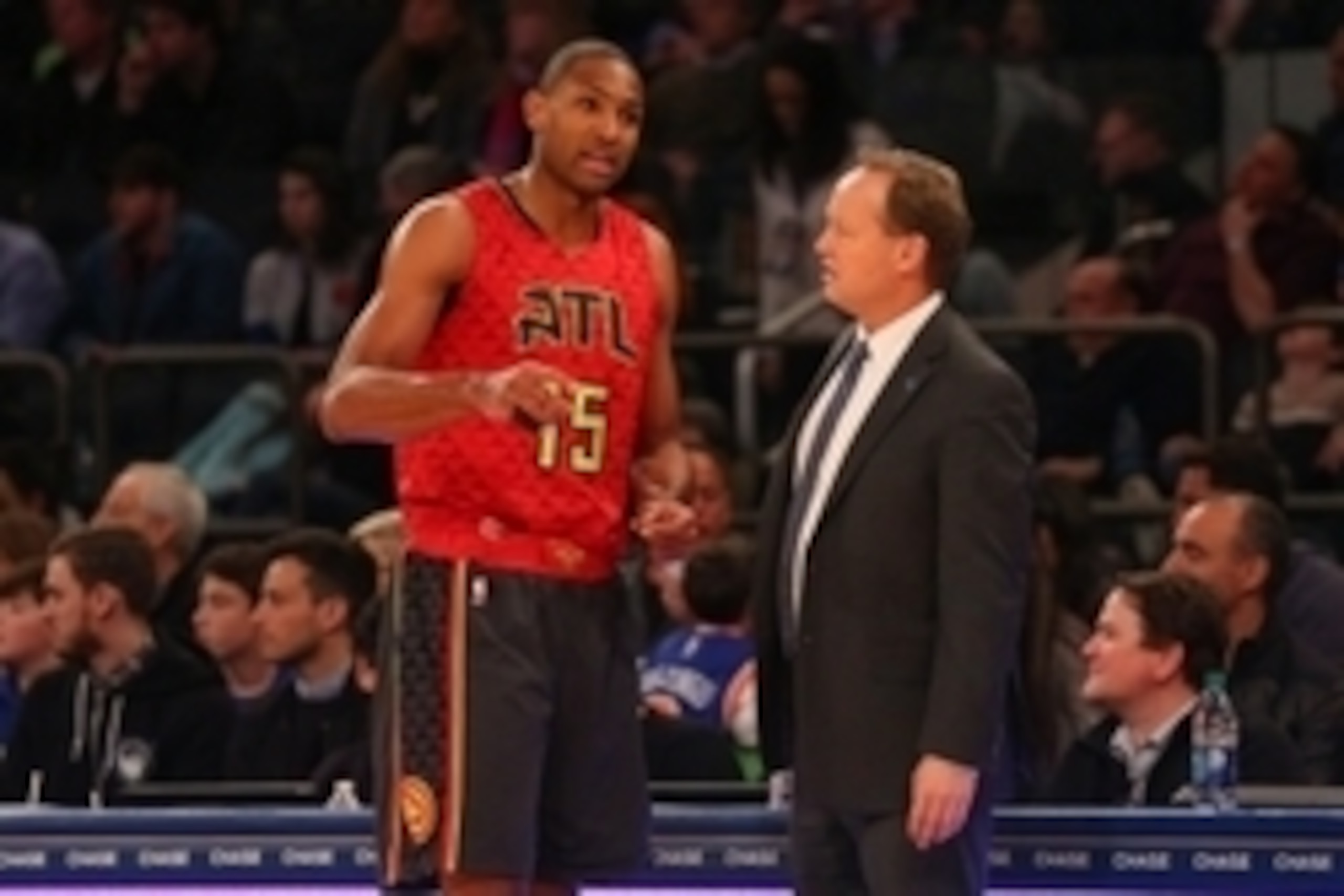 Jan 3, 2016; New York, NY, USA;  Atlanta Hawks center Al Horford (15) talks with head coach Mike Budenholzer during the third quarter against the New York Knicks at Madison Square Garden. New York Knicks won 111-97. Mandatory Credit: Anthony Gruppuso-USA 