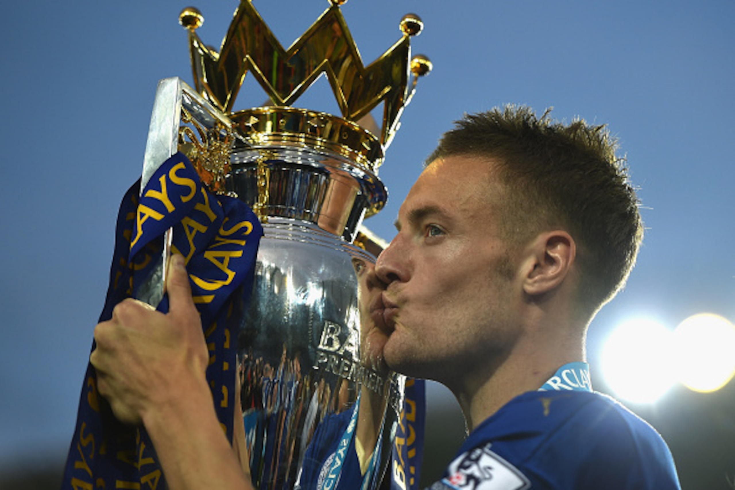 LEICESTER, ENGLAND - MAY 07: Jamie Vardy of Leicester City kisses the Premier League Trophy after the Barclays Premier League match between Leicester City and Everton at The King Power Stadium on May 7, 2016 in Leicester, United Kingdom.  (Photo by Lauren