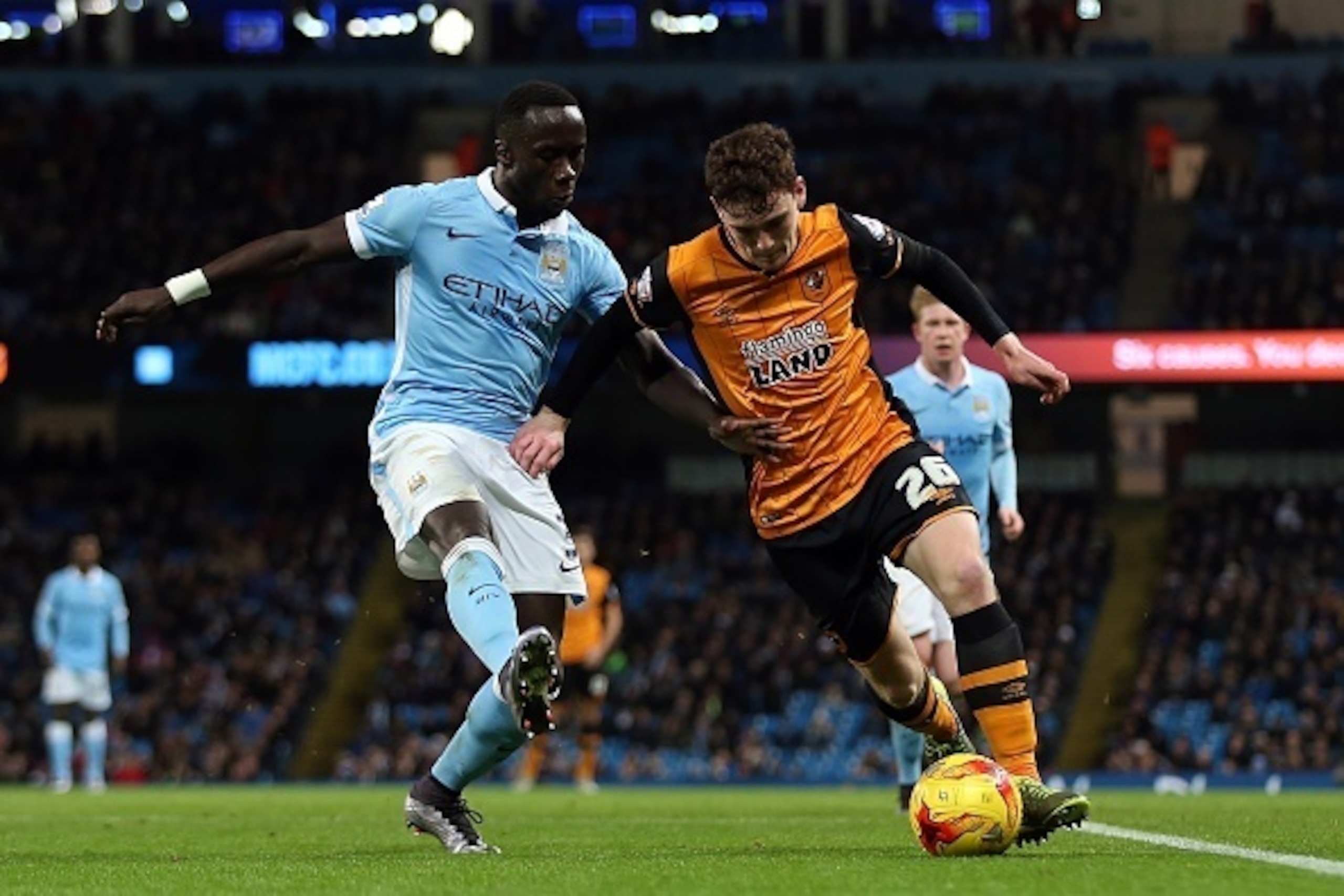 MANCHESTER, ENGLAND - DECEMBER 01: Bacary Sagna of Manchester City in action with Andrew Robertson of Hull City during the Capital One Cup Quarter Final match between Manchester City and Hull City at Etihad Stadium on December 1, 2015 in Manchester, Engla MANCHESTER, ENGLAND - DECEMBER 01: Bacary Sagna of Manchester City in action with Andrew Robertson of Hull City during the Capital One Cup Quarter Final match between Manchester City and Hull City at Etihad Stadium on December 1, 2015 in Manchester, Engla