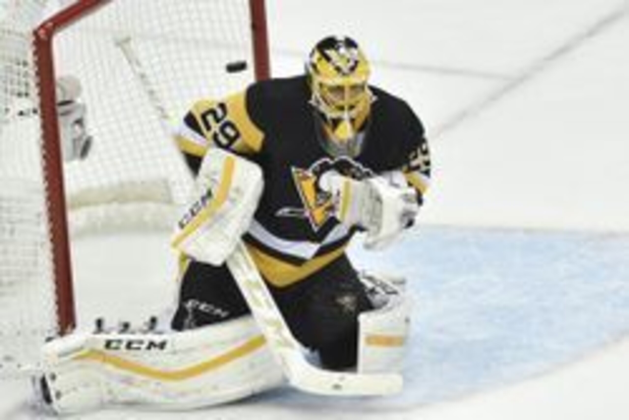 May 22, 2016; Pittsburgh, PA, USA; Pittsburgh Penguins goalie Marc-Andre Fleury (29) tries to make a save as the puck hits off the post on a Tampa Bay Lightning shot during the third period in game five of the Eastern Conference Final of the 2016 Stanley May 22, 2016; Pittsburgh, PA, USA; Pittsburgh Penguins goalie Marc-Andre Fleury (29) tries to make a save as the puck hits off the post on a Tampa Bay Lightning shot during the third period in game five of the Eastern Conference Final of the 2016 Stanley