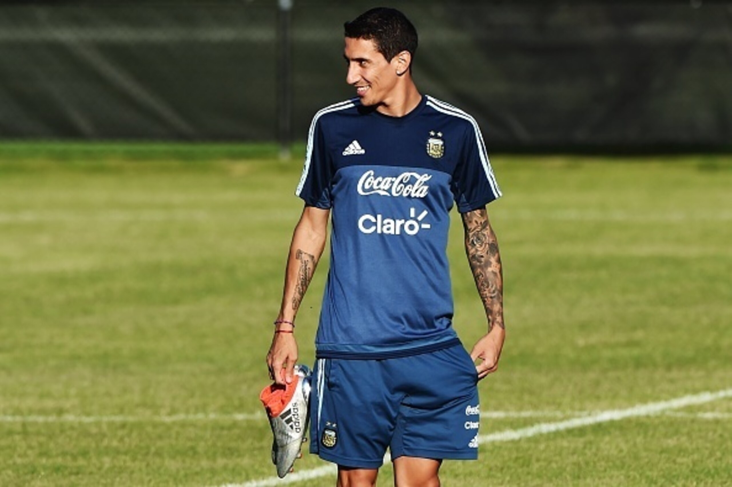 Argentina's national team player Angel Di Maria leaves after a training session at Harvard University in Boston, Massachusetts, on June 16, 2016. 
Argentina will face Venezuela on June 18 in their quarterfinal match of the Copa America. / AFP / NELSON ALM