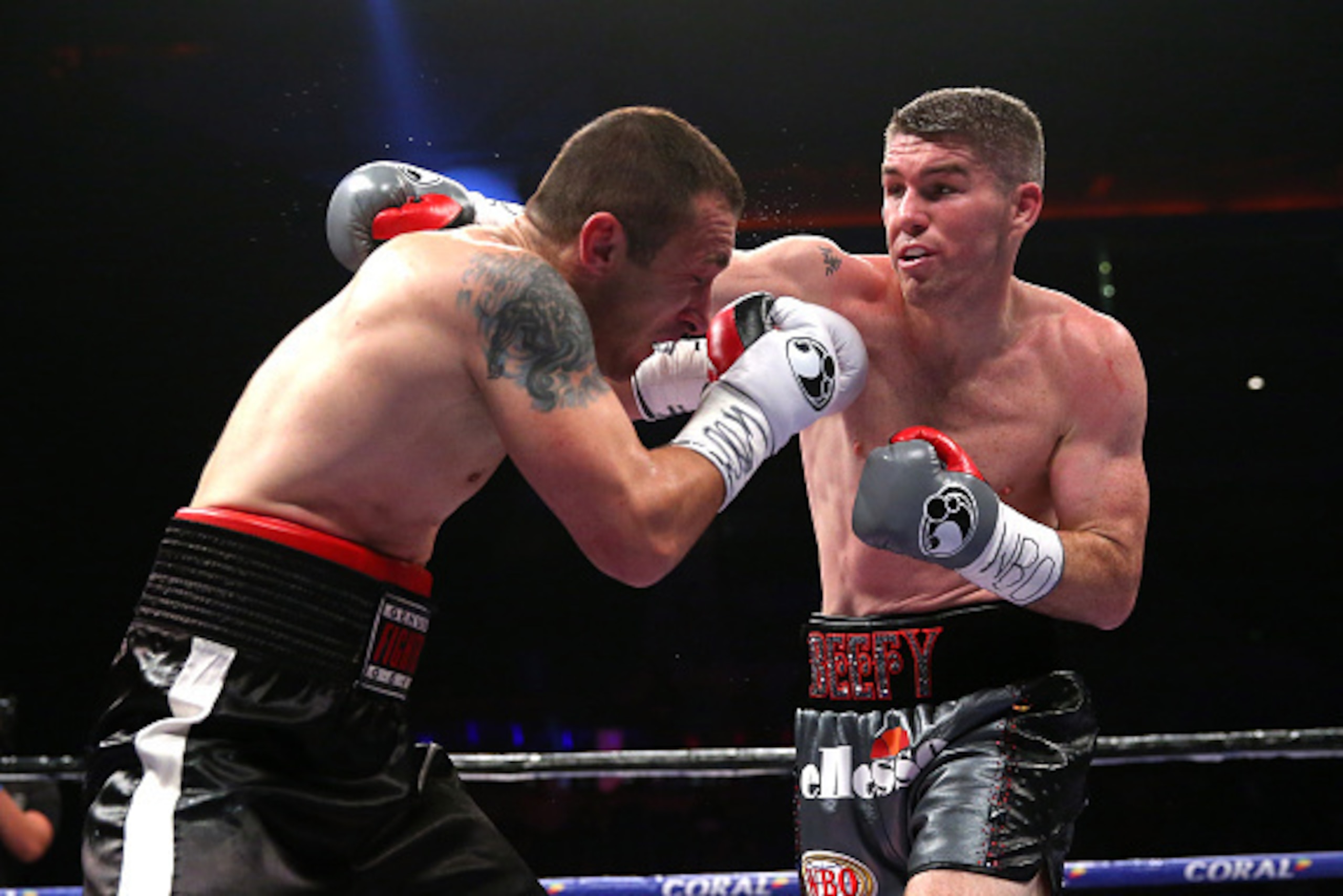 LIVERPOOL, ENGLAND - JUNE 04:  Liam Smith lands a right hand shot on Predrag Radosevic during the WBO World Super-Welterweight Championship fight between Liam Smith and Predrag Radosevic at Echo Arena on June 4, 2016 in Liverpool, England.  (Photo by Alex