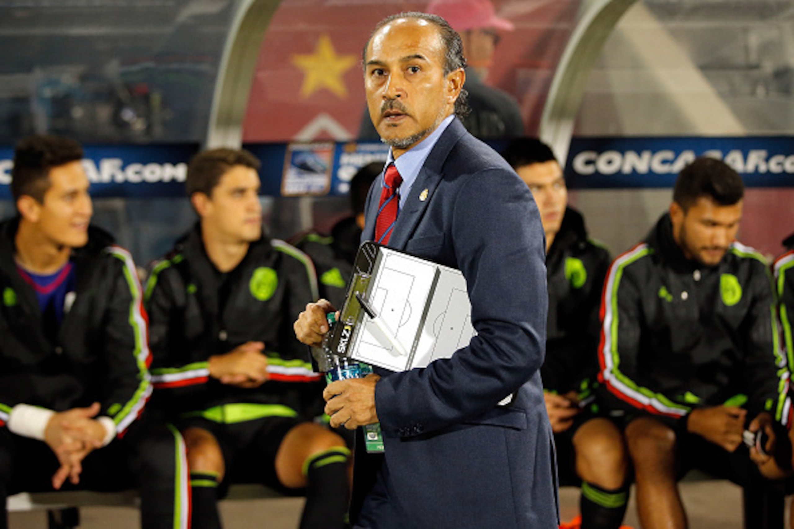 COMMERCE CITY, CO - OCTOBER 07:  Head coach Raul Gutierrez of Mexico prepares to lead his team against Honduras during 2015 CONCACAF Olympic Qualifying at Dick's Sporting Goods Park on October 7, 2015 in Commerce City, Colorado.  (Photo by Doug Pensinger/
