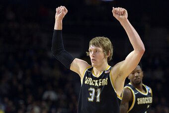 PROVIDENCE, RI - MARCH 19: Ron Baker #31 of the Wichita State Shockers reacts against the Miami Hurricanes during the second round of the 2016 NCAA Men's Basketball Tournament at Dunkin' Donuts Center on March 19, 2016 in Providence, Rhode Island. (Photo 