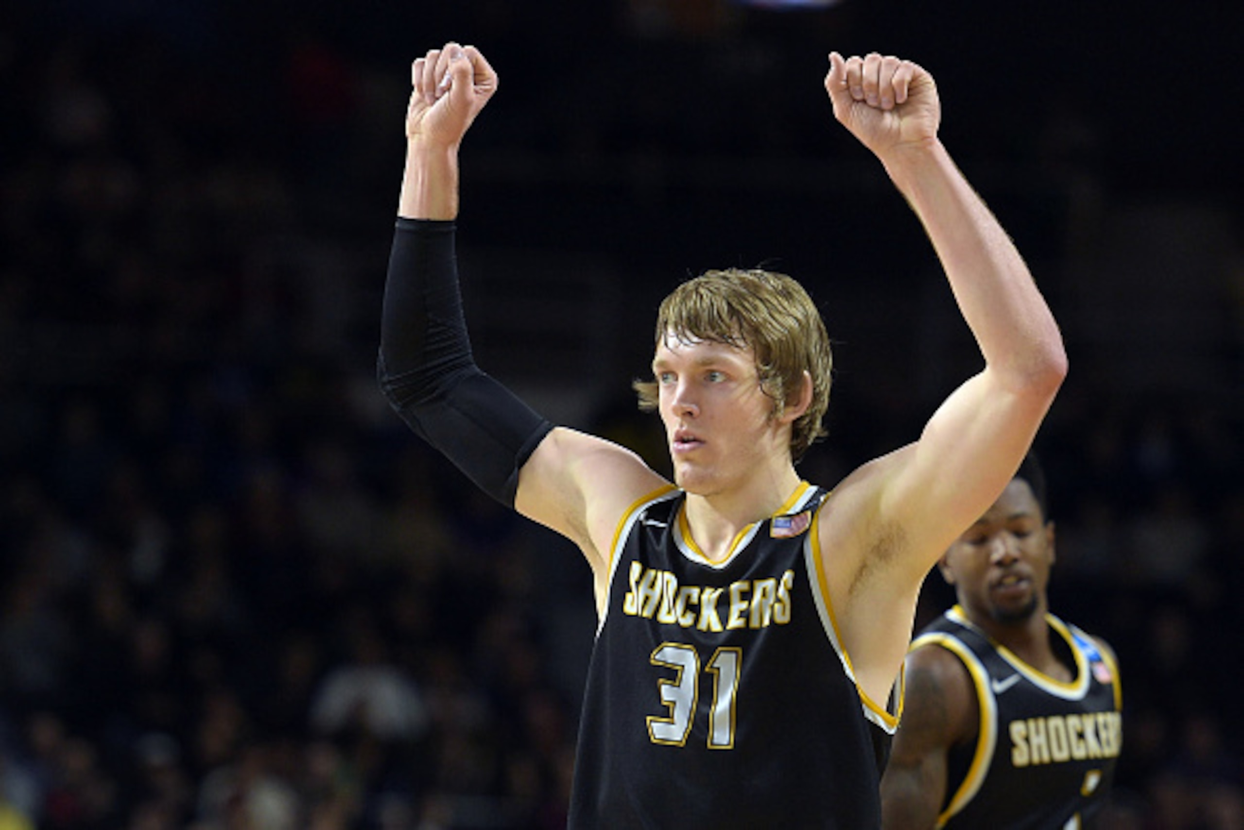PROVIDENCE, RI - MARCH 19: Ron Baker #31 of the Wichita State Shockers reacts against the Miami Hurricanes during the second round of the 2016 NCAA Men's Basketball Tournament at Dunkin' Donuts Center on March 19, 2016 in Providence, Rhode Island. (Photo 