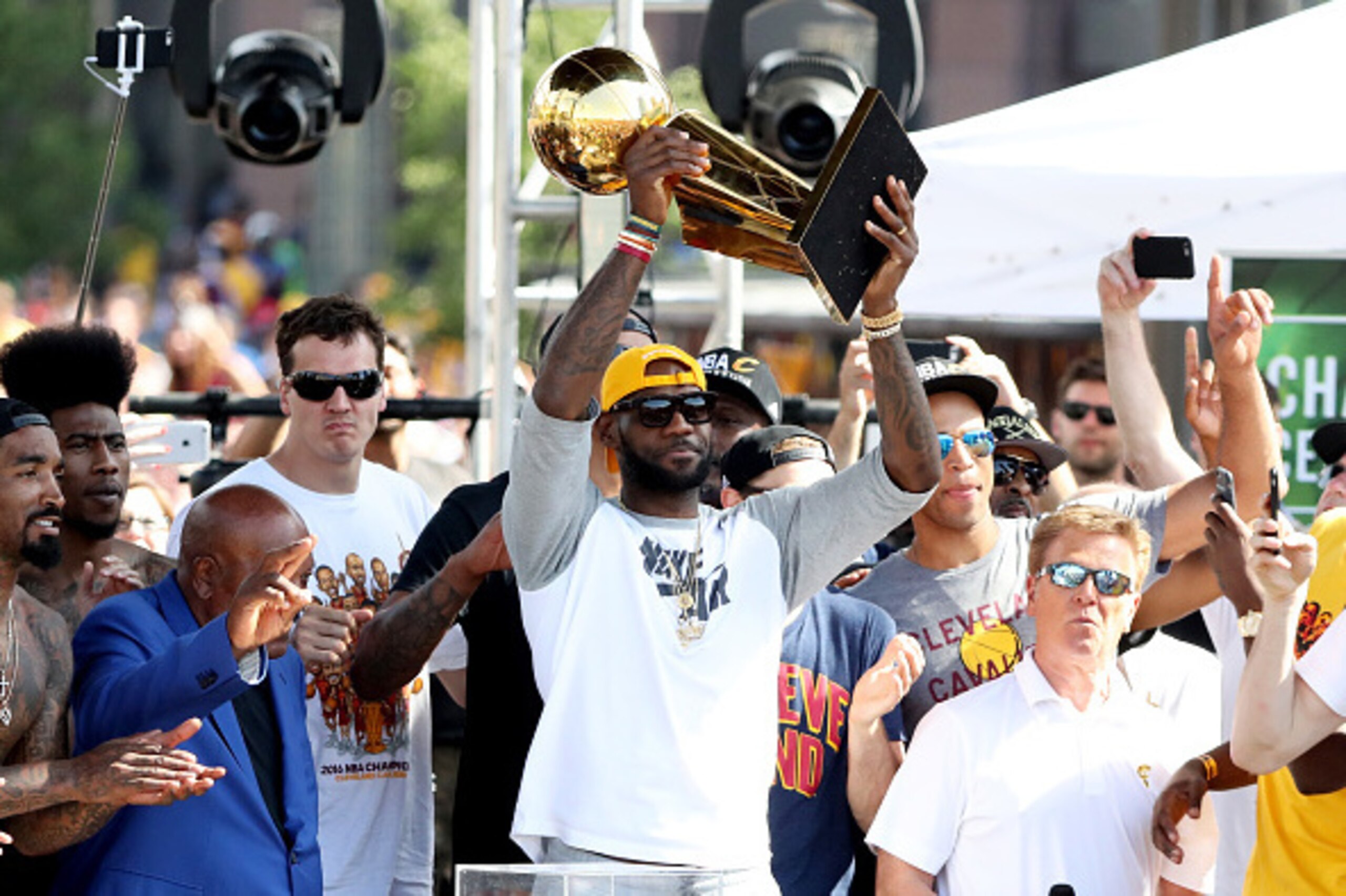 CLEVELAND, OH - JUNE 22: LeBron James #23 of the Cleveland Cavaliers holds up the Larry O'Brien Trophy during the Cleveland Cavaliers 2016 NBA Championship victory parade and rally on June 22, 2016 in Cleveland, Ohio. (Photo by Mike Lawrie/Getty Images) CLEVELAND, OH - JUNE 22: LeBron James #23 of the Cleveland Cavaliers holds up the Larry O'Brien Trophy during the Cleveland Cavaliers 2016 NBA Championship victory parade and rally on June 22, 2016 in Cleveland, Ohio. (Photo by Mike Lawrie/Getty Images)