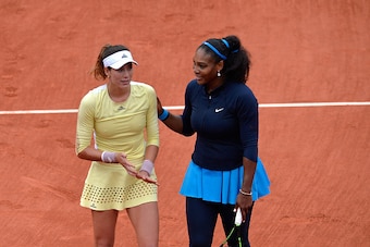 PARIS, FRANCE - JUNE 04:  Serena Williams of the United states of America congratulates Garbin Muguruza of Spain  after her victory during the women's singles final match on day fourteen of the 2016 French Open at Roland Garros on June 4, 2016 in Paris, F