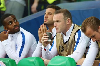 SAINT-ETIENNE, FRANCE - JUNE 20:  Danny Rose, Kyle Walker, Wayne Rooney and Harry Kane of England sit on the bench prior to the UEFA EURO 2016 Group B match between Slovakia and England at Stade Geoffroy-Guichard on June 20, 2016 in Saint-Etienne, France.