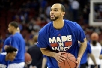 Mar 26, 2016; Louisville, KY, USA; Kansas Jayhawks forward Perry Ellis (34) warms up before the game against the Villanova Wildcats in the south regional final of the NCAA Tournament at KFC YUM!. Mandatory Credit: Jamie Rhodes-USA TODAY Sports