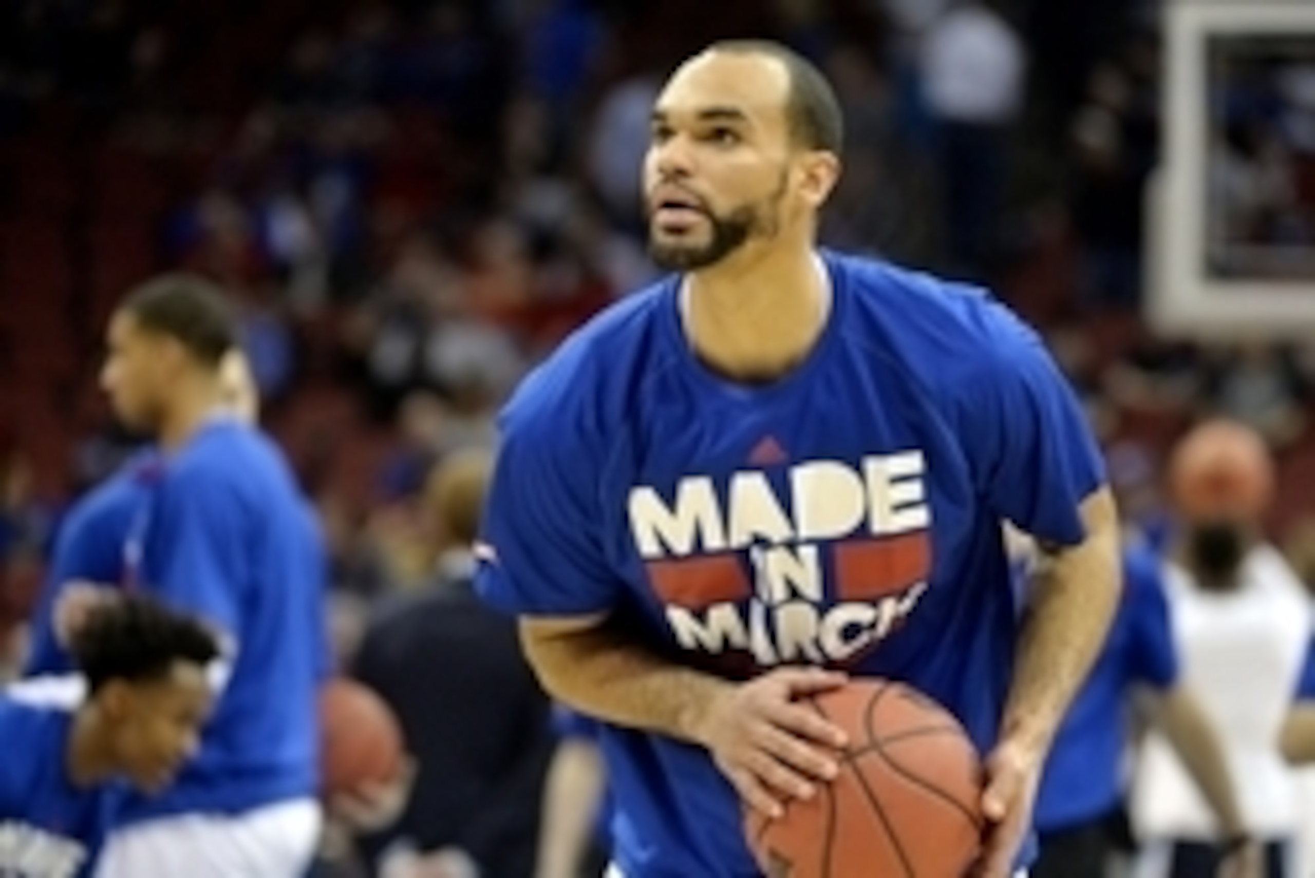 Mar 26, 2016; Louisville, KY, USA; Kansas Jayhawks forward Perry Ellis (34) warms up before the game against the Villanova Wildcats in the south regional final of the NCAA Tournament at KFC YUM!. Mandatory Credit: Jamie Rhodes-USA TODAY Sports