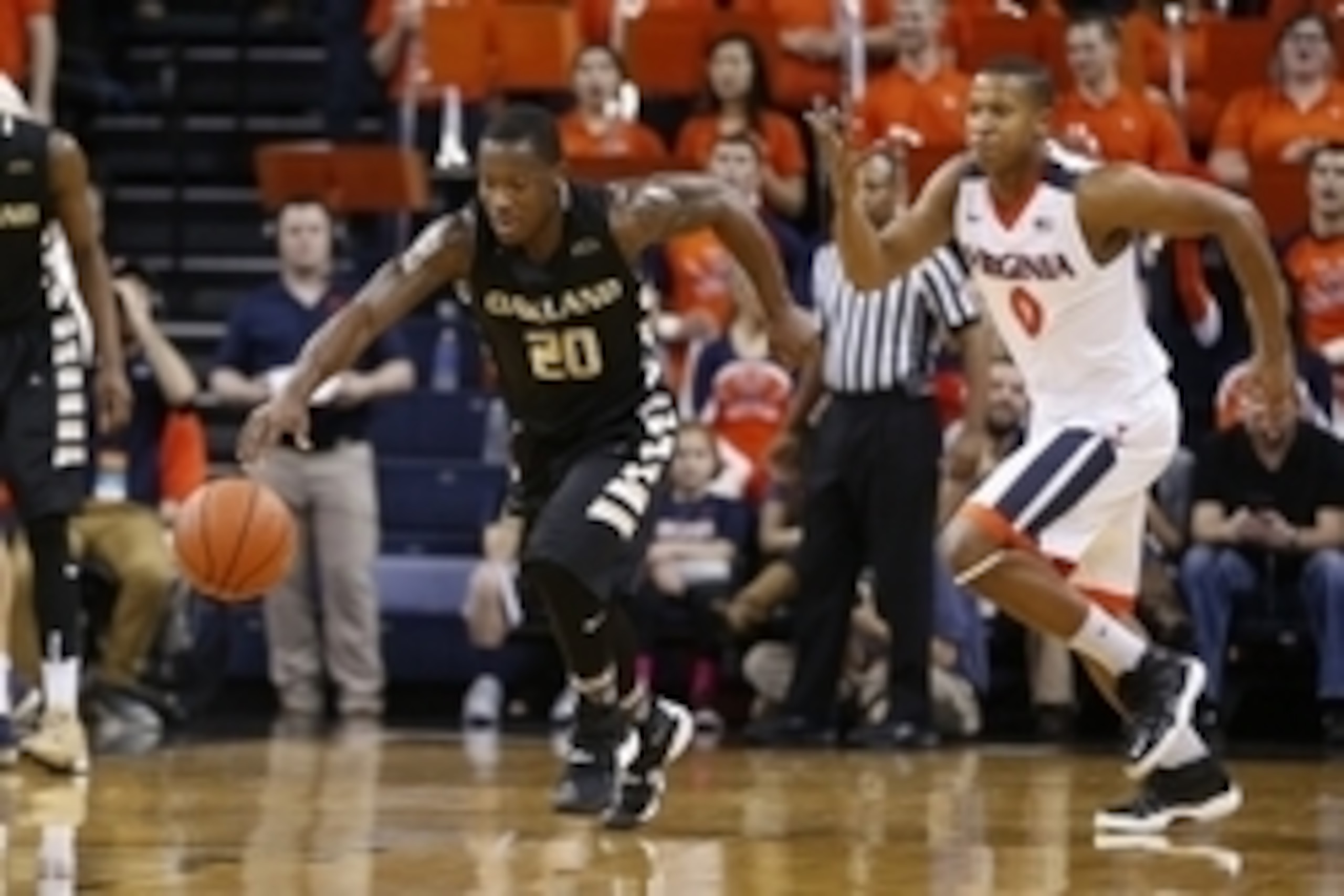 Dec 30, 2015; Charlottesville, VA, USA; Oakland Golden Grizzlies guard Kay Felder (20) steals the ball away from Virginia Cavaliers guard Devon Hall (0) during the first half at John Paul Jones Arena. Mandatory Credit: Amber Searls-USA TODAY Sports