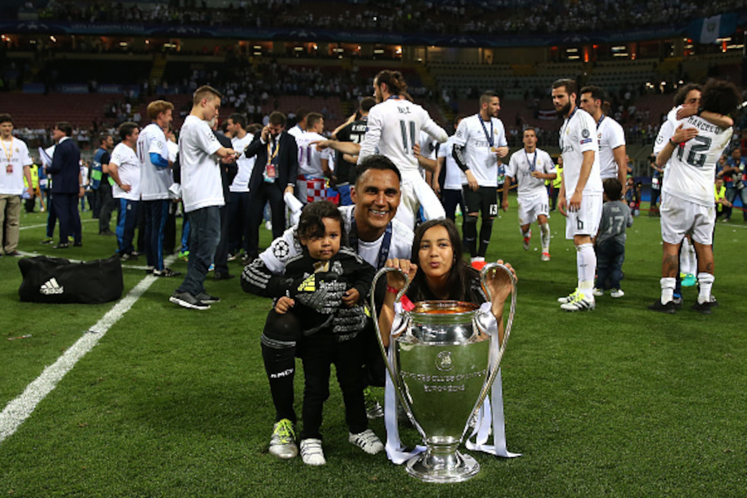 MILAN, ITALY - MAY 28: Keylor Navas of Real Madrid celebrates with the trophy following the UEFA Champions League Final between Real Madrid and Club Atletico de Madrid at Stadio Giuseppe Meazza on May 28, 2016 in Milan, Italy. (Photo by Chris Brunskill Lt