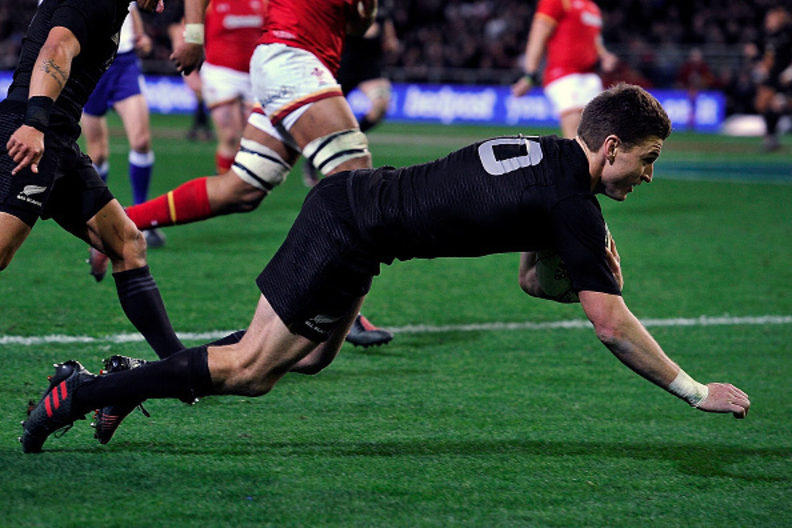 New Zealand's Beauden Barrett scores a try during the third rugby union Test match between the New Zealand All Blacks and Wales at Forsyth Barr Stadium in Dunedin on June 25, 2016.  / AFP / Marty Melville        (Photo credit should read MARTY MELVILLE/AF