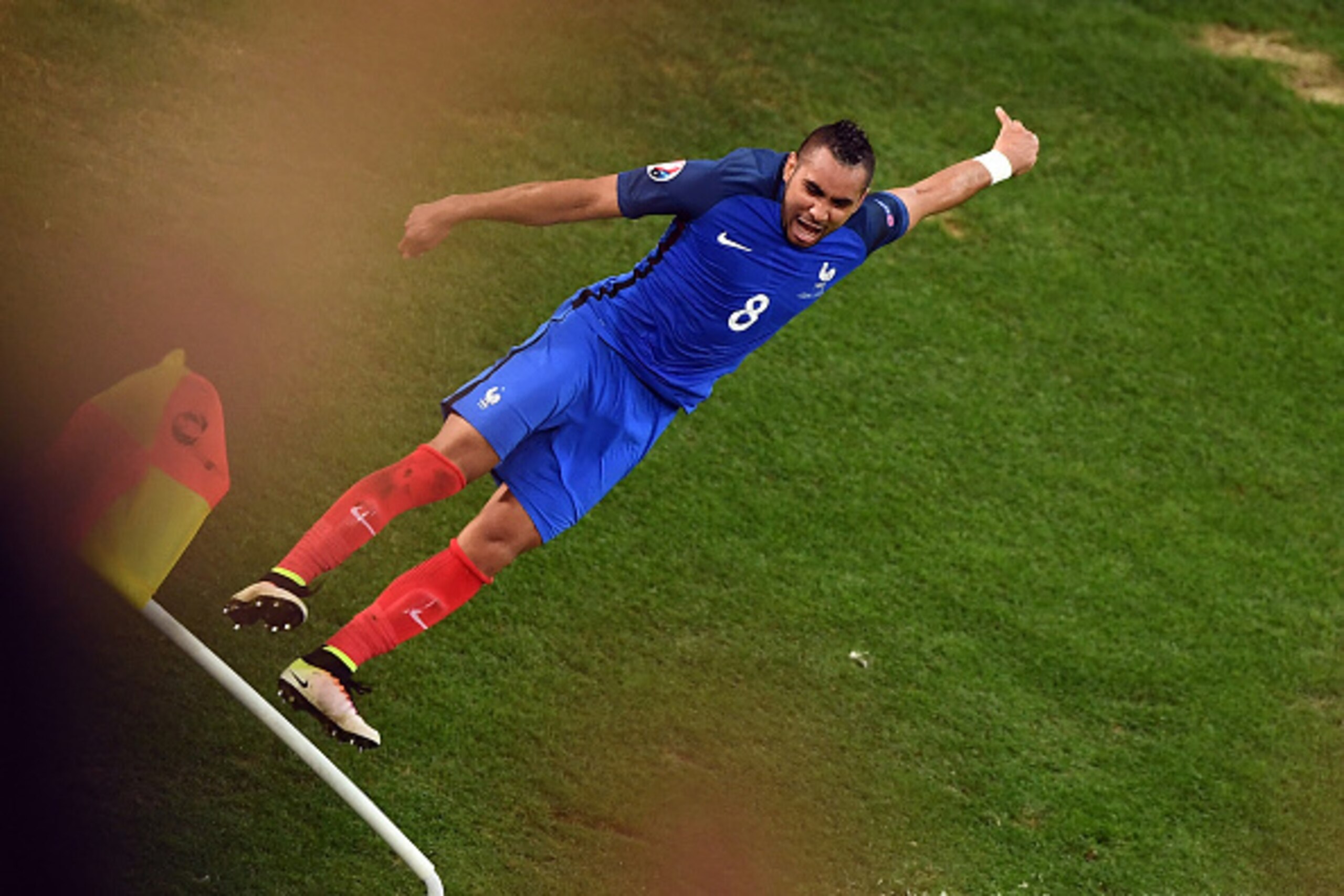 France's forward Dimitri Payet celebrates after scoring during the Euro 2016 group A football match between France and Albania at the Velodrome stadium in Marseille on June 15, 2016. / AFP / ANNE-CHRISTINE POUJOULAT        (Photo credit should read ANNE-C