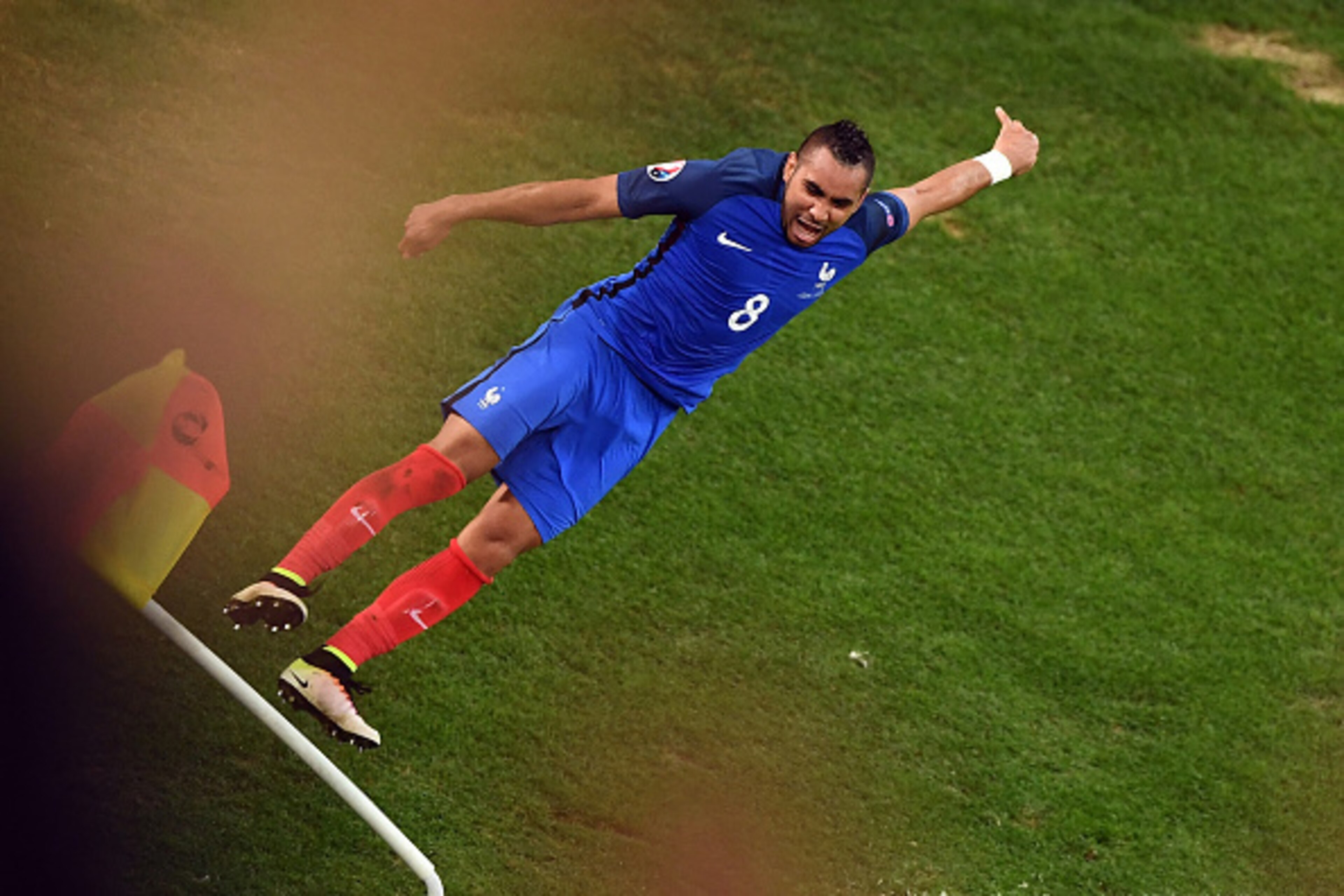 France's forward Dimitri Payet celebrates after scoring during the Euro 2016 group A football match between France and Albania at the Velodrome stadium in Marseille on June 15, 2016. / AFP / ANNE-CHRISTINE POUJOULAT        (Photo credit should read ANNE-C
