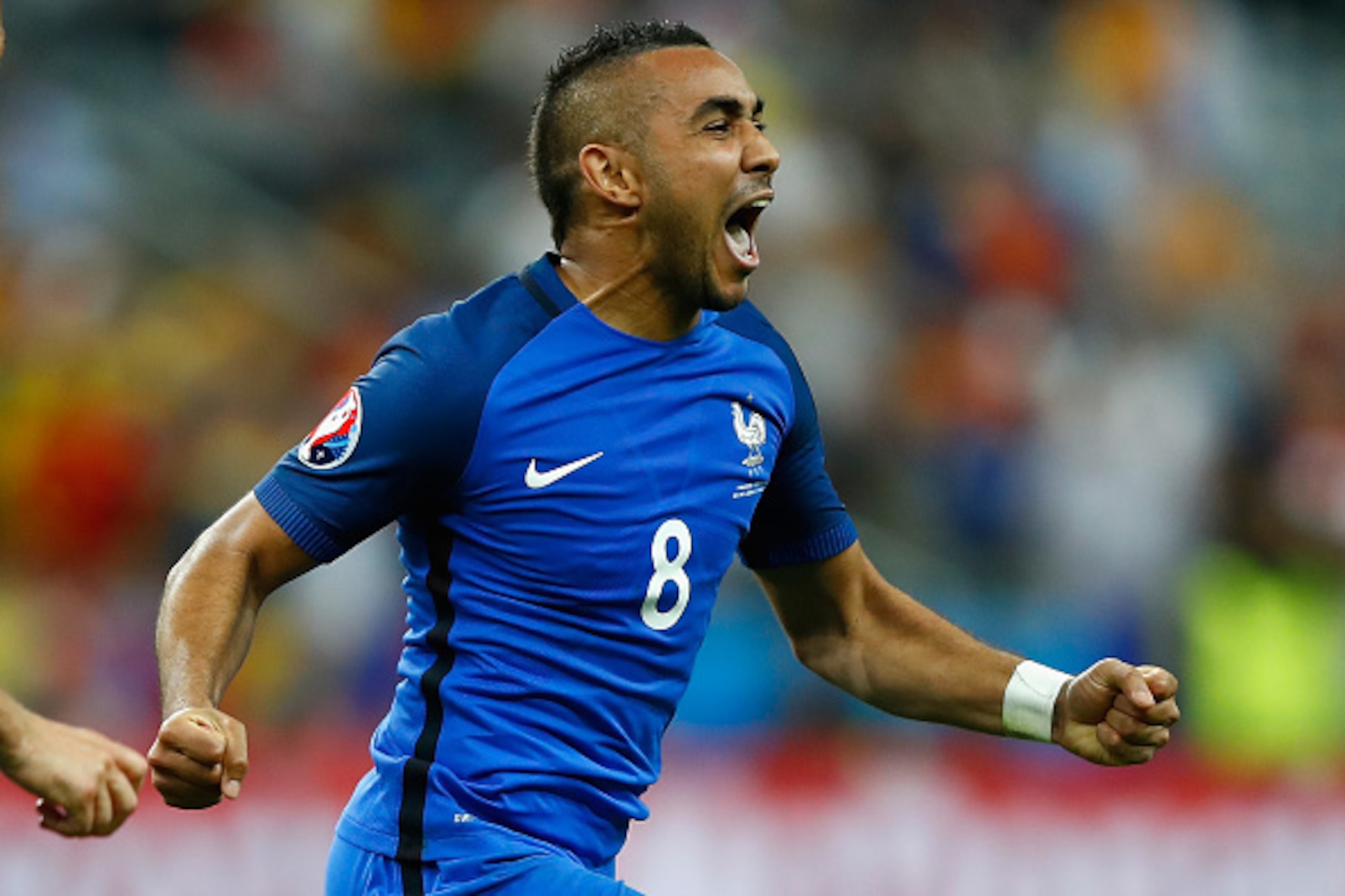 PARIS, FRANCE - JUNE 10:  Dimitri Payet of France celebrates scoring his team's second goal during the UEFA Euro 2016 Group A match between France and Romania at Stade de France on June 10, 2016 in Paris, France.  (Photo by Clive Rose/Getty Images)