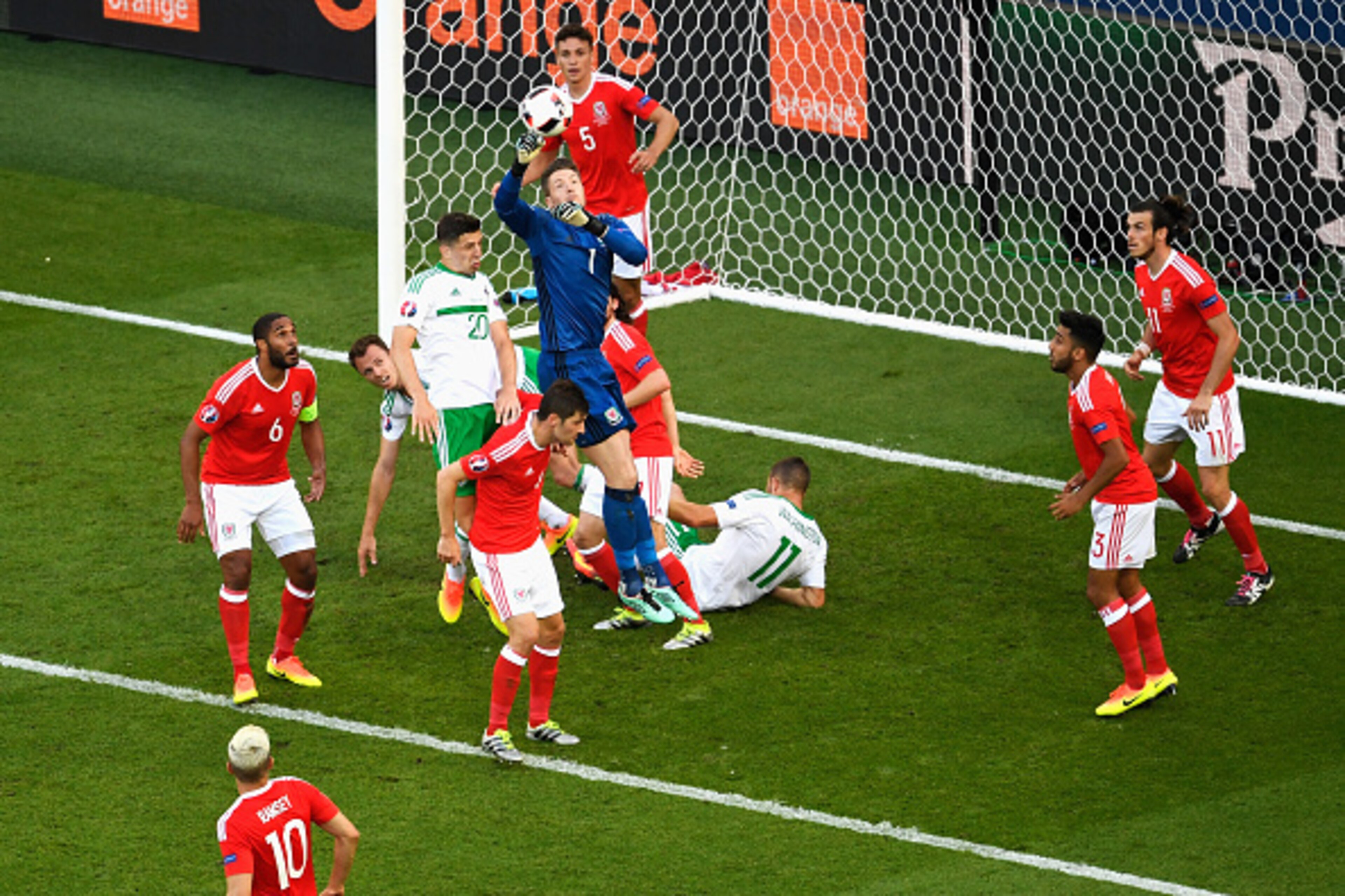 PARIS, FRANCE - JUNE 25: Wayne Hennessey of Wales punches the ball to clear during the UEFA EURO 2016 round of 16 match between Wales and Northern Ireland at Parc des Princes on June 25, 2016 in Paris, France.  (Photo by Mike Hewitt/Getty Images)