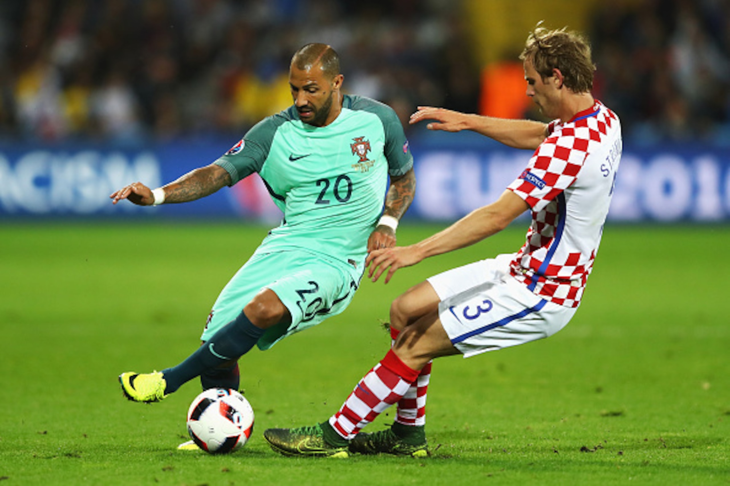 LENS, FRANCE - JUNE 25: Ricardo Quaresma of Portugal is tackled by Ivan Strinic of Croatia during the UEFA EURO 2016 round of 16 match between Croatia and Portugal at Stade Bollaert-Delelis on June 25, 2016 in Lens, France. (Photo by Clive Mason/Getty I LENS, FRANCE - JUNE 25: Ricardo Quaresma of Portugal is tackled by Ivan Strinic of Croatia during the UEFA EURO 2016 round of 16 match between Croatia and Portugal at Stade Bollaert-Delelis on June 25, 2016 in Lens, France. (Photo by Clive Mason/Getty I