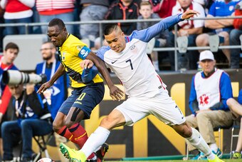 SEATTLE, WA - JUNE 16: Bobby Wood #7 of United States battles Walter Ayovi #10 of Ecuador during the Copa America Centenario Quarterfinal match between United States and Ecuador at CenturyLink Field on June 16, 2016 in Seattle, Washington. The United Stat
