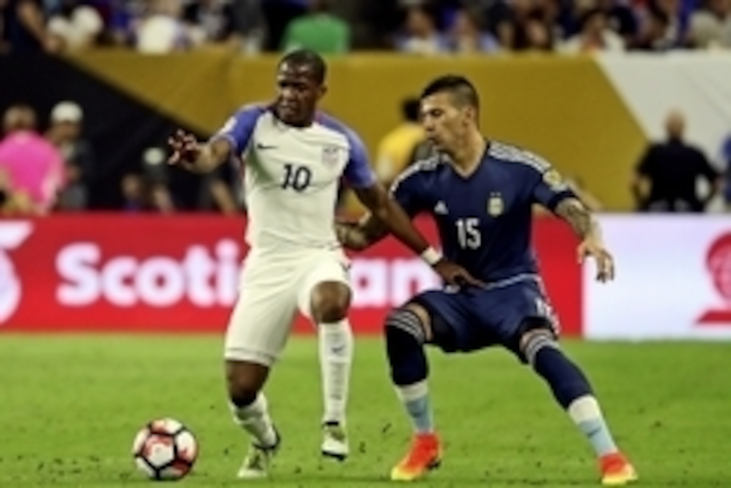 Jun 21, 2016; Houston, TX, USA; United States midfielder Darlington Nagbe (10) and Argentina defender Victor Cuesta (15) battle for the ball during the match in the semifinals of the 2016 Copa America Centenario soccer tournament at NRG Stadium. Mandatory