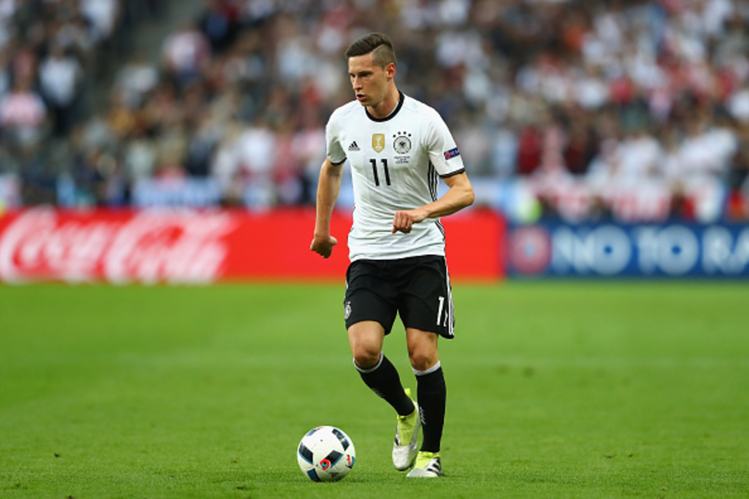 PARIS, FRANCE - JUNE 16:  Julian Draxler  of Germany runs with the ball during the UEFA EURO 2016 Group C match between Germany and Poland at Stade de France on June 16, 2016 in Paris, France.  (Photo by Alexander Hassenstein/Getty Images)