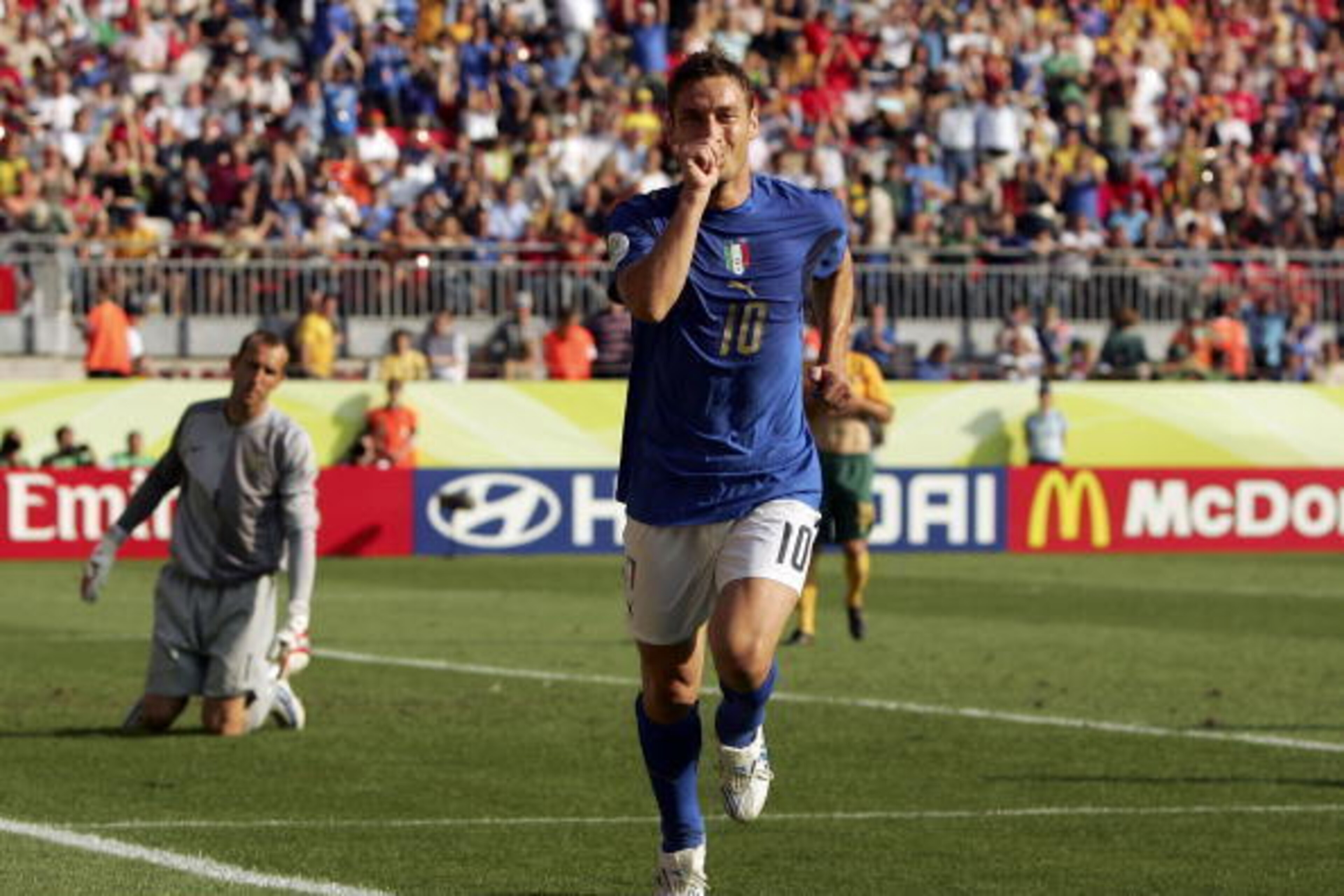 KAISERSLAUTERN, GERMANY - JUNE 26:  Francesco Totti of Italy celebrates, after scoring the match winning penalty during the FIFA World Cup Germany 2006 Round of 16 match between Italy and Australia at the Fritz-Walter Stadium on June 26, 2006 in Kaisersla