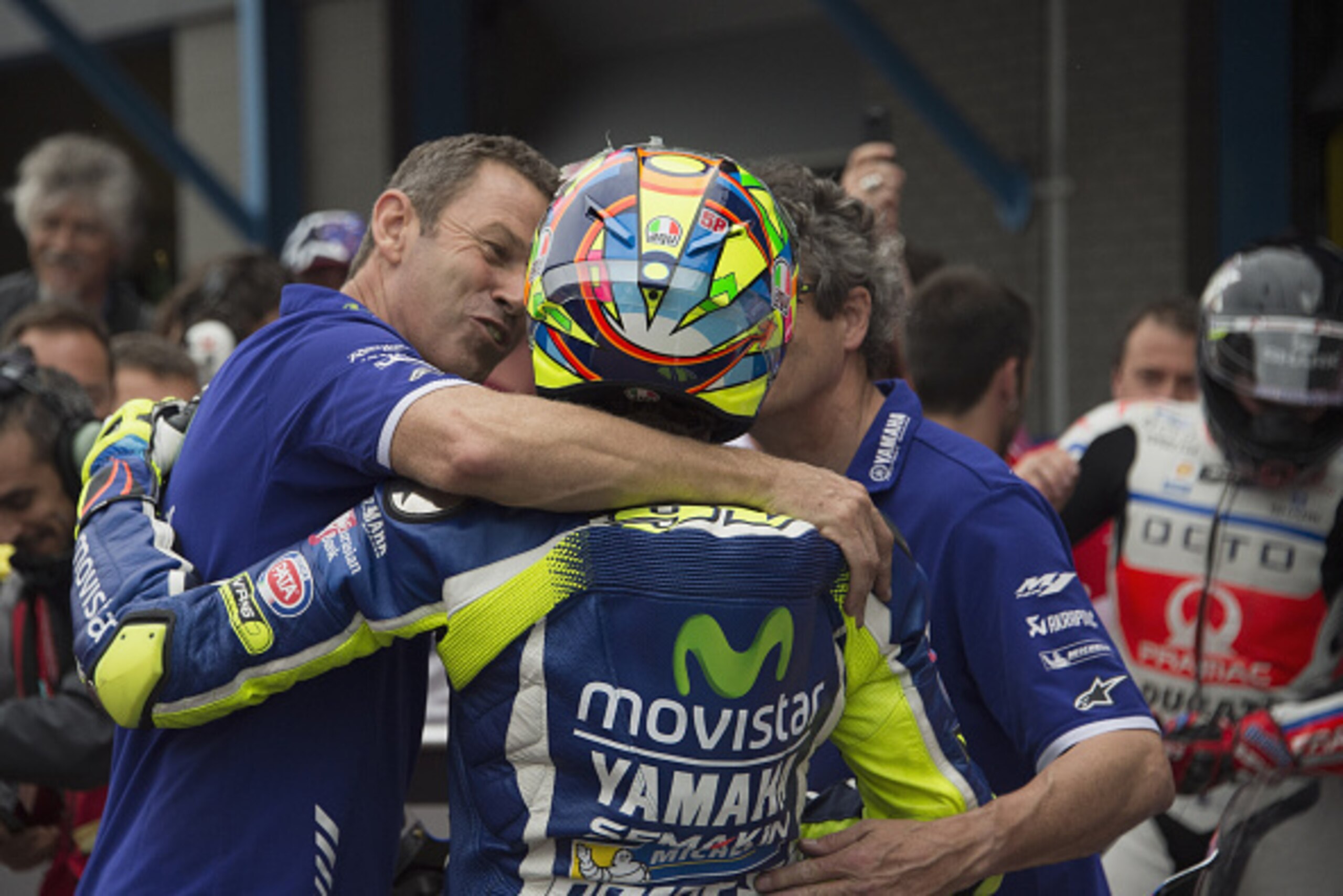 ASSEN, NETHERLANDS - JUNE 25: Valentino Rossi of Italy and Movistar Yamaha MotoGP celebrate with team the second place at the end of the qualifying practice during the at MotoGP Netherlands - Qualifying on June 25, 2016 in Assen, Netherlands. (Photo by ASSEN, NETHERLANDS - JUNE 25: Valentino Rossi of Italy and Movistar Yamaha MotoGP celebrate with team the second place at the end of the qualifying practice during the at MotoGP Netherlands - Qualifying on June 25, 2016 in Assen, Netherlands. (Photo by